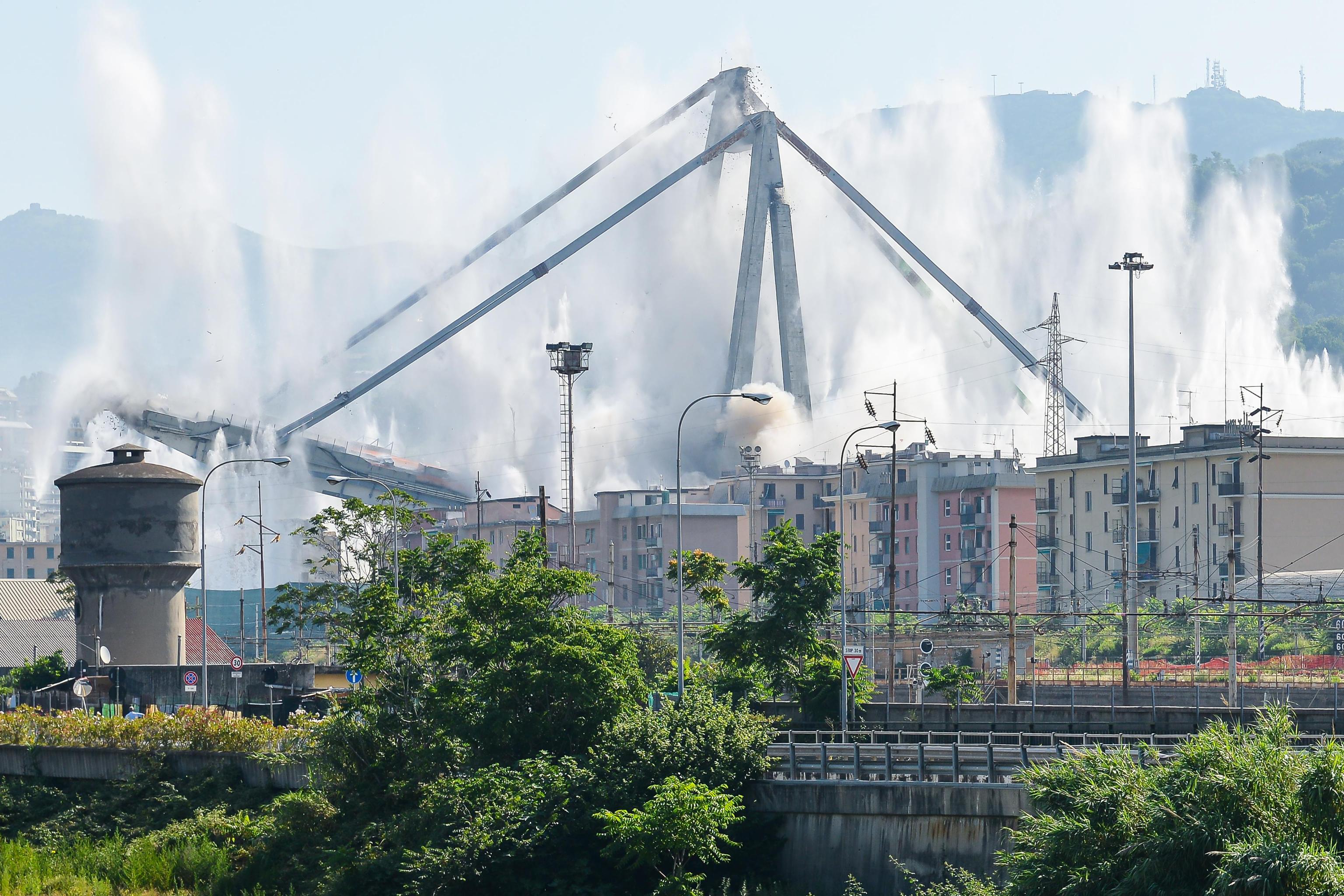 A general view of the demolition "pile" 10 and 11 Morandi bridge with micro-explosive charges, in Genoa, Italy, 28 june 2019. The new viaduct replacing the Morandi bridge is expected to be completed by  2020. The Morandi bridge partially collapsed on 14 august 2018 killing 43 people. ANSA/LUCA ZENNARO