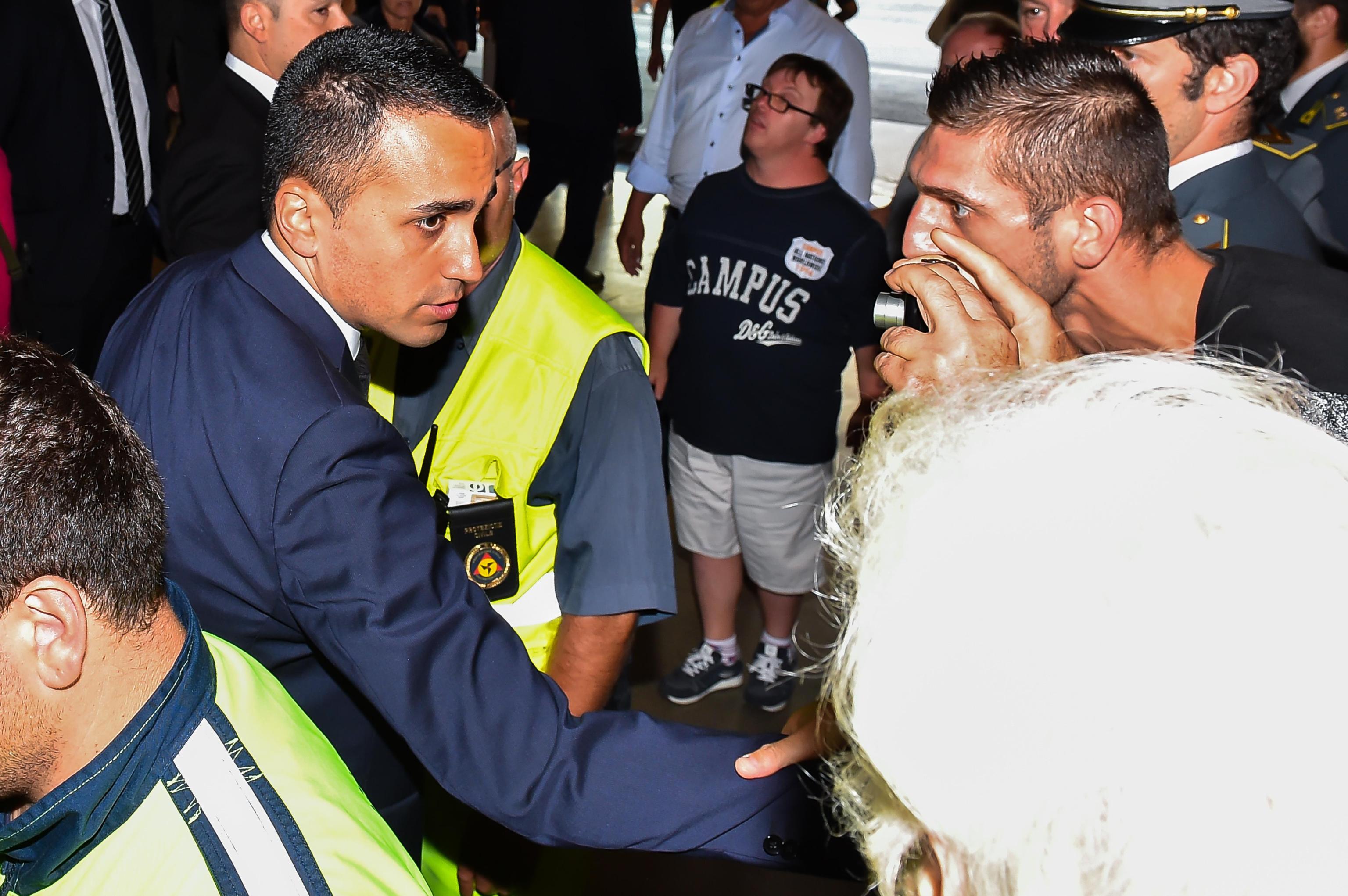 Italian Deputy Premier and Labour Minister Luigi Di Maio (L) leaves the Fair of Genoa after State funerals of the victims of Morandi highway bridge collapse in Genoa, Italy, 18 August 2018
ANSA/SIMONE ARVEDA