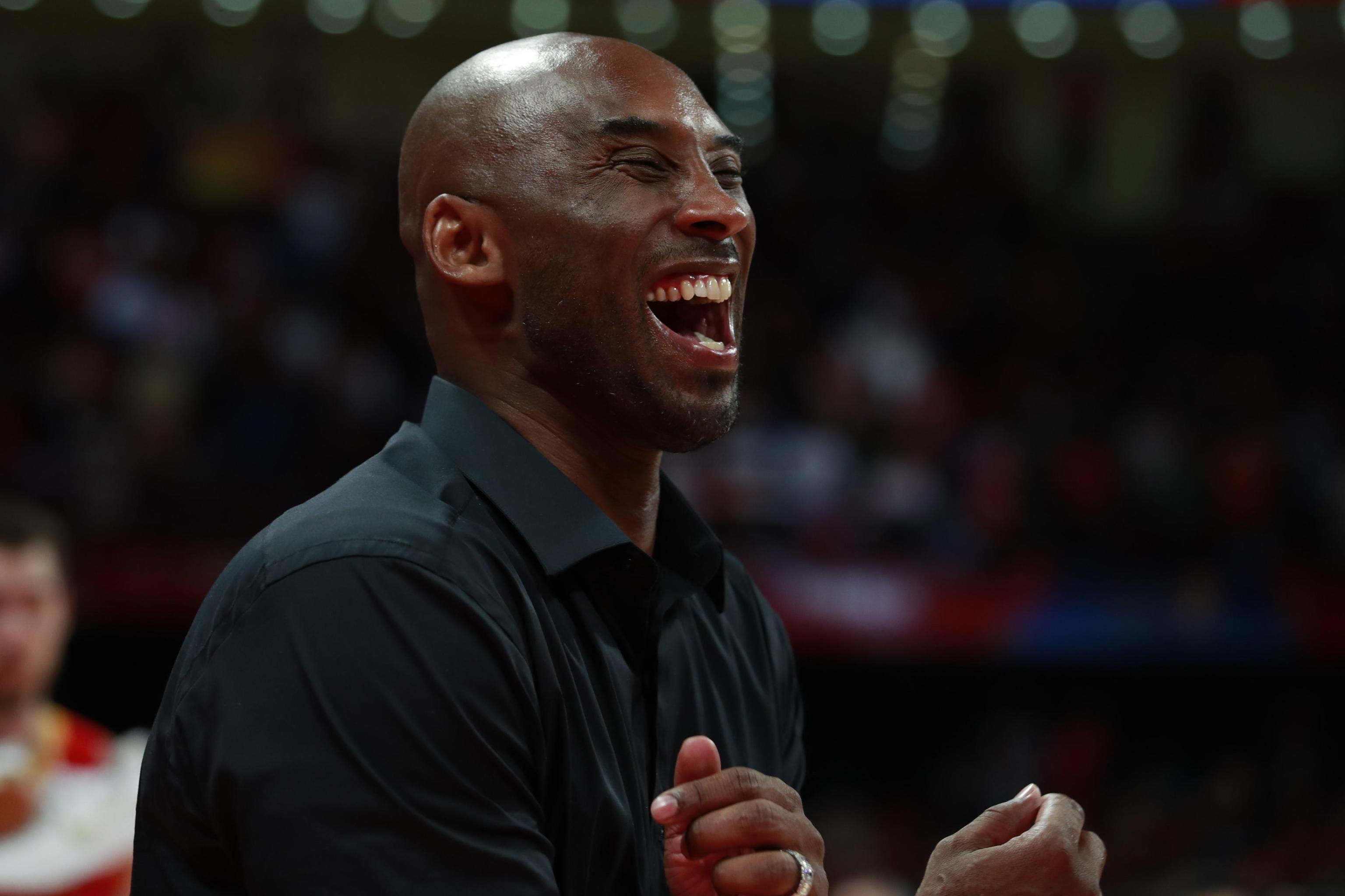 epa07844734 US former basketball player Kobe Bryan reacts during thre award ceremony following the FIBA Basketball World Cup 2019 final match between Argentina and Spain, in Beijing, China, 15 September 2019.  EPA/HOW HWEE YOUNG