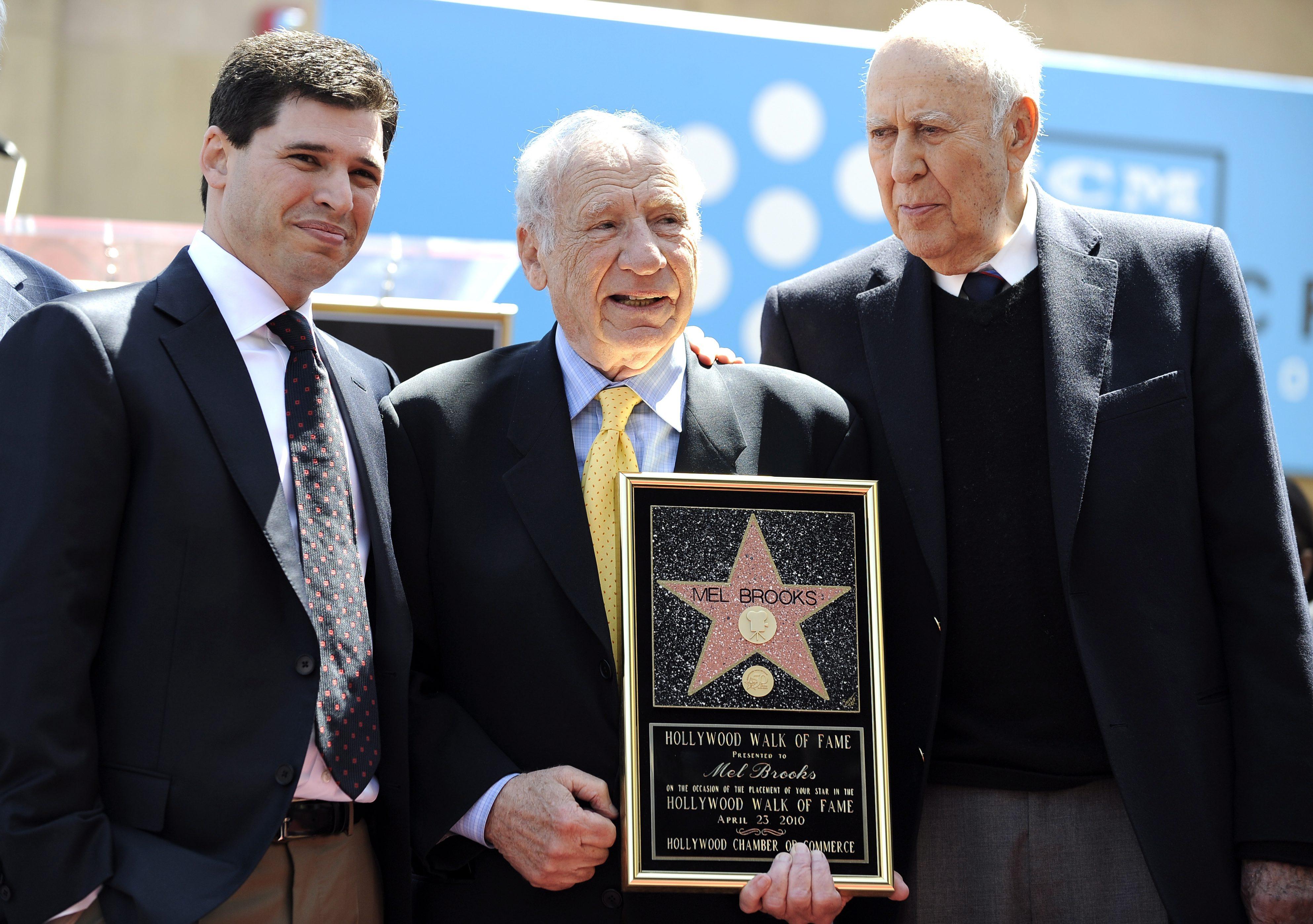 epa02129630 US writer and director and actor Mel Brooks (C) poses for photos with his Son Max (L) and actor Carl Reiner during the dedication ceremony for his new Star on the Hollywood Walk of Fame in Hollywood, California, USA 23 April 2010.  EPA/ANDREW GOMBERT