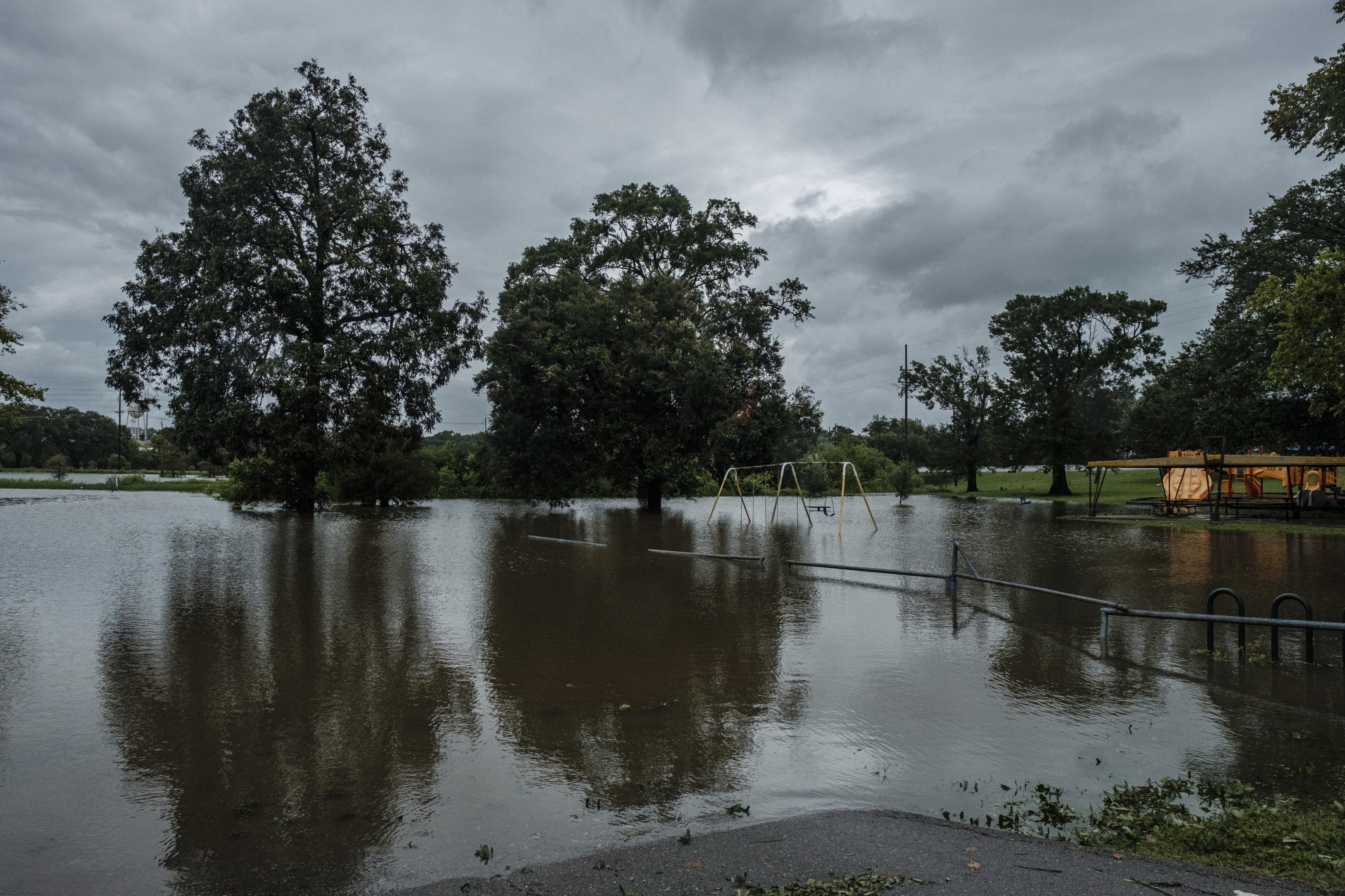 epa08629083 A playground is flooded from Hurricane Laura in Lafayette, Louisiana, USA, 27 August 2020. Hurricane Laura made landfall early in the morning as a Category 4 Hurricane.  EPA/DAN ANDERSON