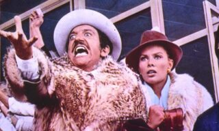 Gigi Proietti nel personaggio di Mandrake nel film Febbre da Cavallo - 1976