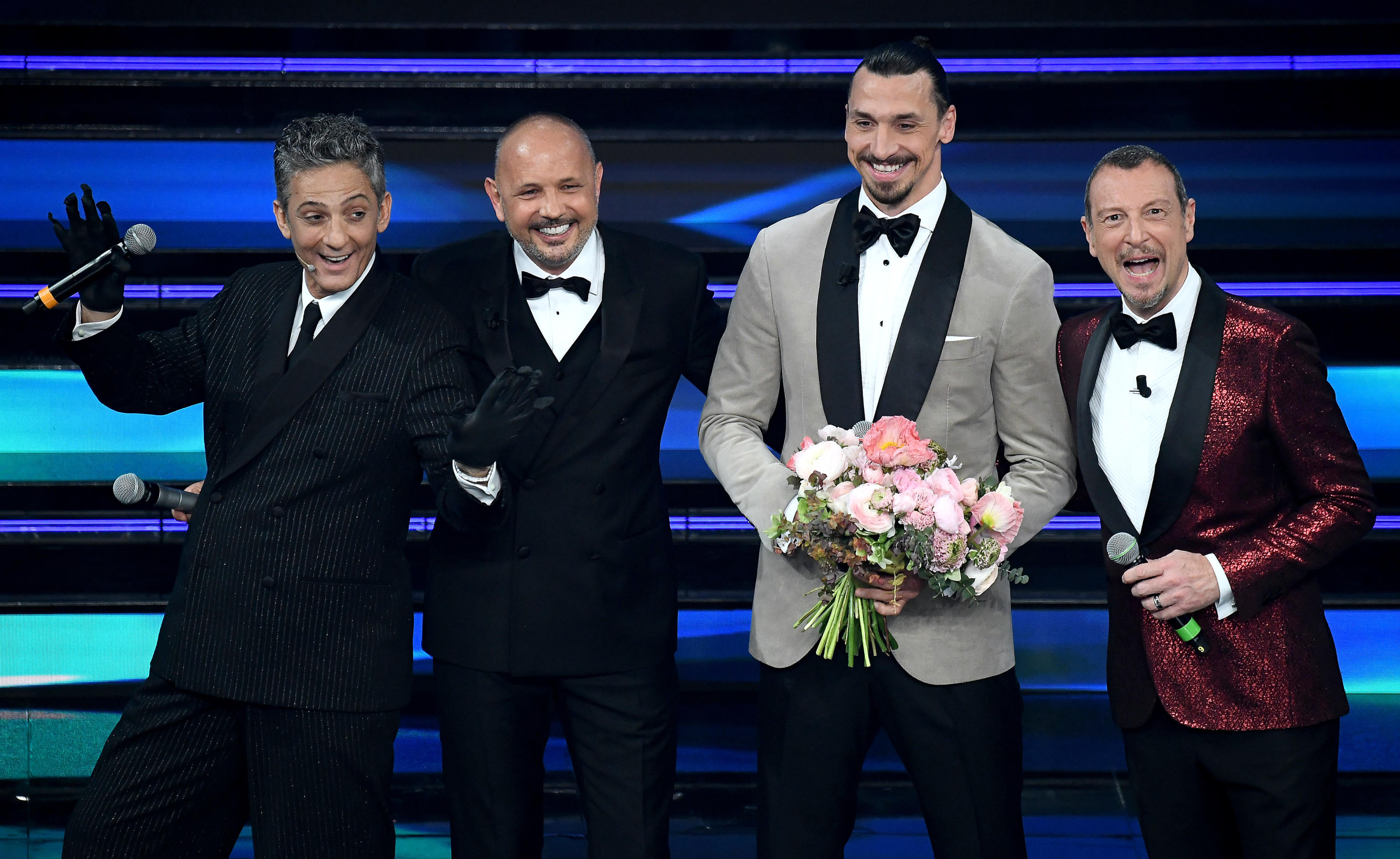 (L-R) Italian showman Rosario Fiorello, Bologna's Head Coach Sinisa Mihajlovic, Milan's Swedish forward Zlatan Ibrahimovic and Sanremo Festival host and artistic director, Amadeus on stage at the Ariston theatre during the 71st Sanremo Italian Song Festival, Sanremo, Italy, 04 March 2021. The festival runs from 02 to 06 March.    ANSA/ETTORE FERRARI