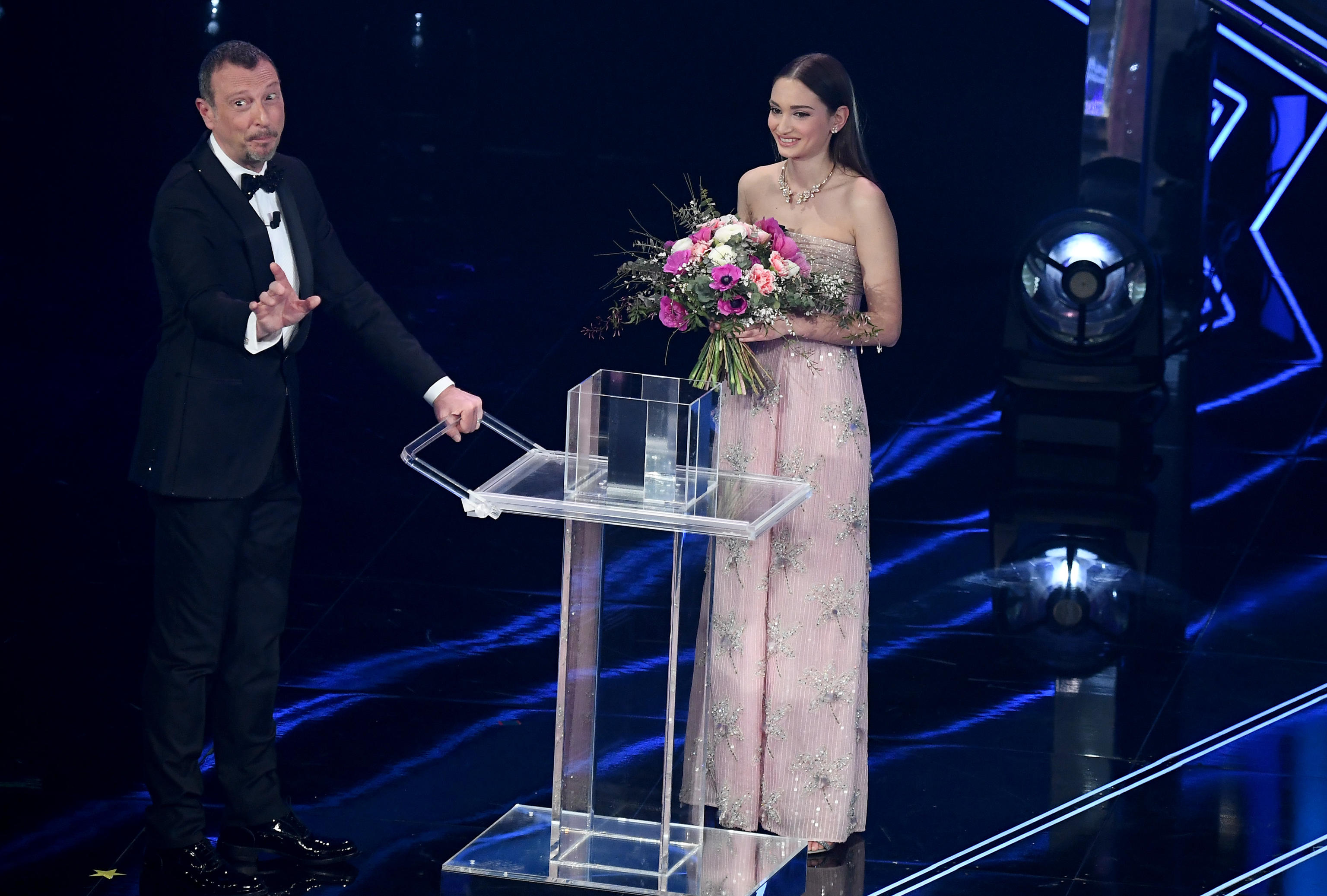 Sanremo Festival host and artistic director, Amadeus, and  Alessia Bonari, the nurse of a hospital in Milan became the symbol of the fight against the Covid-19 when a photo of her, taken at the beginning of March with the lockdown just started, showed his face swollen because of the protective mask worn during a very long shift of work, became viral on the Web on stage at the Ariston theatre during the 71st Sanremo Italian Song Festival, Sanremo, Italy, 02 March 2021. The festival runs from 02 to 06 March.    ANSA/ETTORE FERRARI