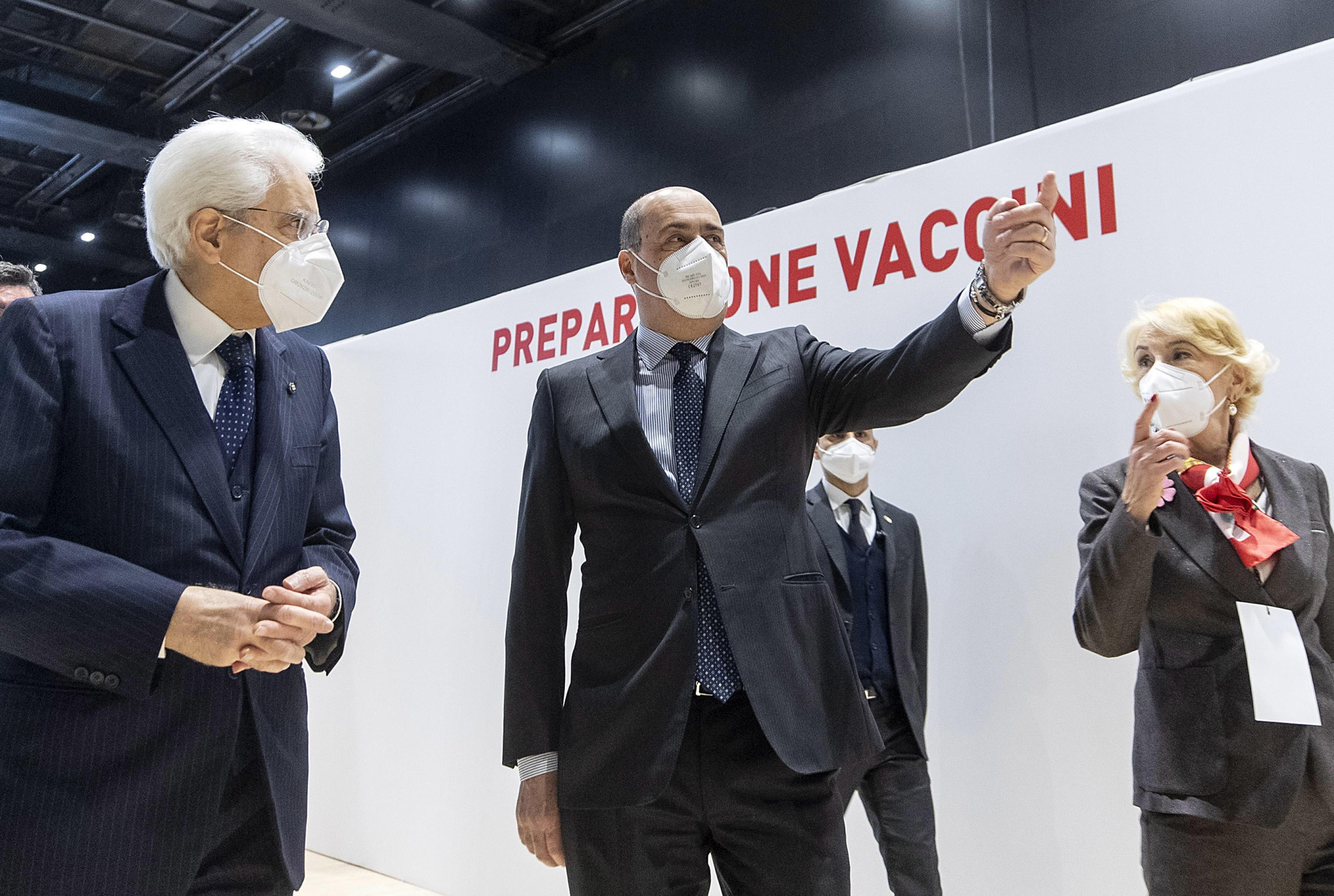 epa09056194 A handout photo made available by the Quirinale Palace Press Office shows Italian President Sergio Mattarella (L) flanked by  the President of the Lazio Region Nicola Zingaretti (C) during a visit to the new coronavirus vaccination center, set up at the 'La Nuvola' EUR Congress Center, Rome, Italy, 06 March 2021.  EPA/PAOLO GIANDOTTI / QUIRINALE / HANDOUT  HANDOUT EDITORIAL USE ONLY/NO SALES