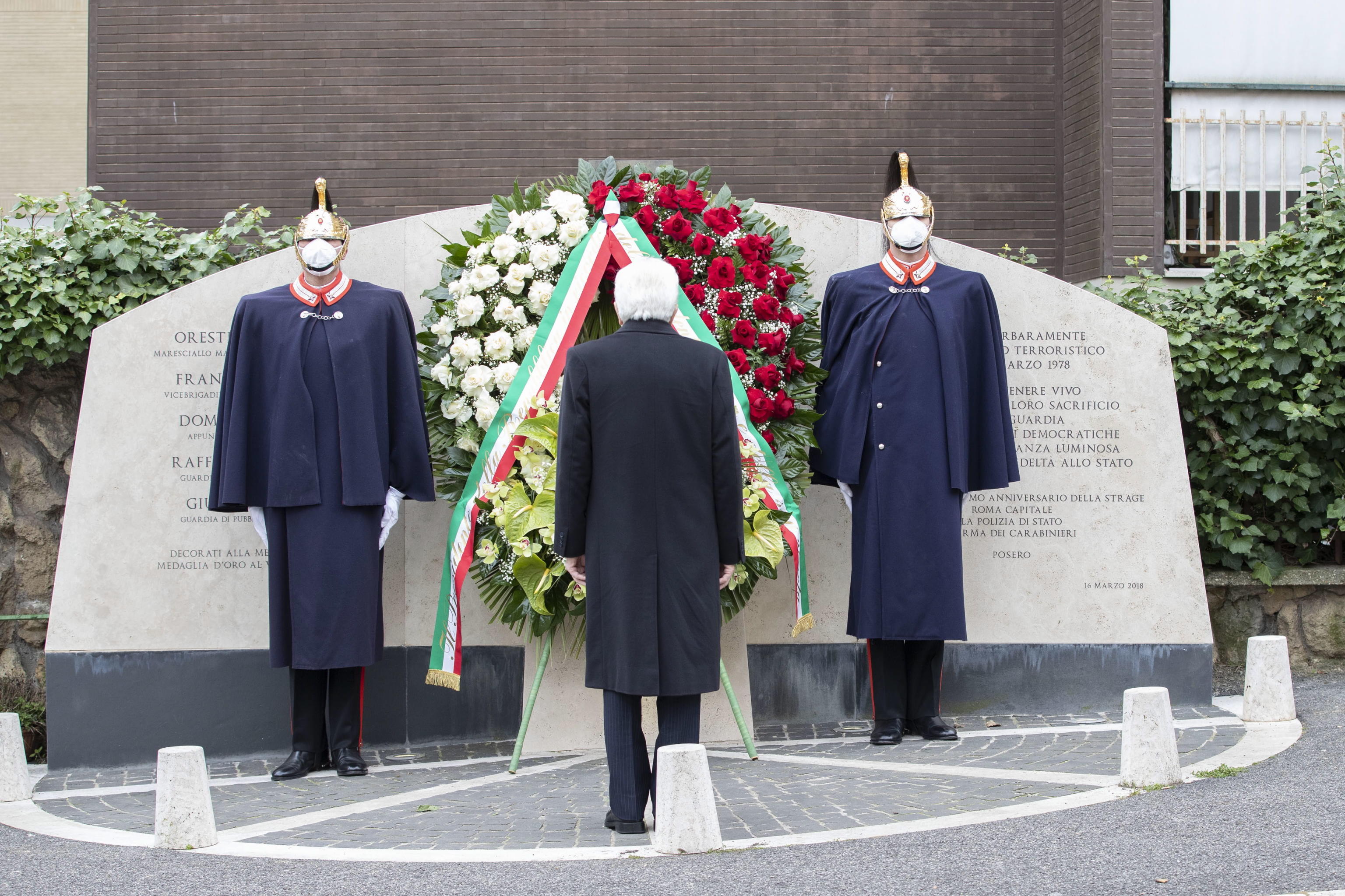 epa09077629 A handout photo made available by the Quirinale palace shows Italy's President Sergio Mattarella (C) attending a ceremony at a memorial in Via Mario Fani marking the 43th anniversary of the kidnapping of former 'Democratia Cristiana' party president Aldo Moro by the terrorist 'Red Brigades' in 1978, in Rome, Italy, 16 March 2021. The ceremony marks the 43th anniversary of the kidnapping of Aldo Moro and murder of his bodyguards, which ended with the death of the hostage on 09 May 1978.  EPA/QUIRINALE / Francesco Ammendola HANDOUT  HANDOUT EDITORIAL USE ONLY/NO SALES