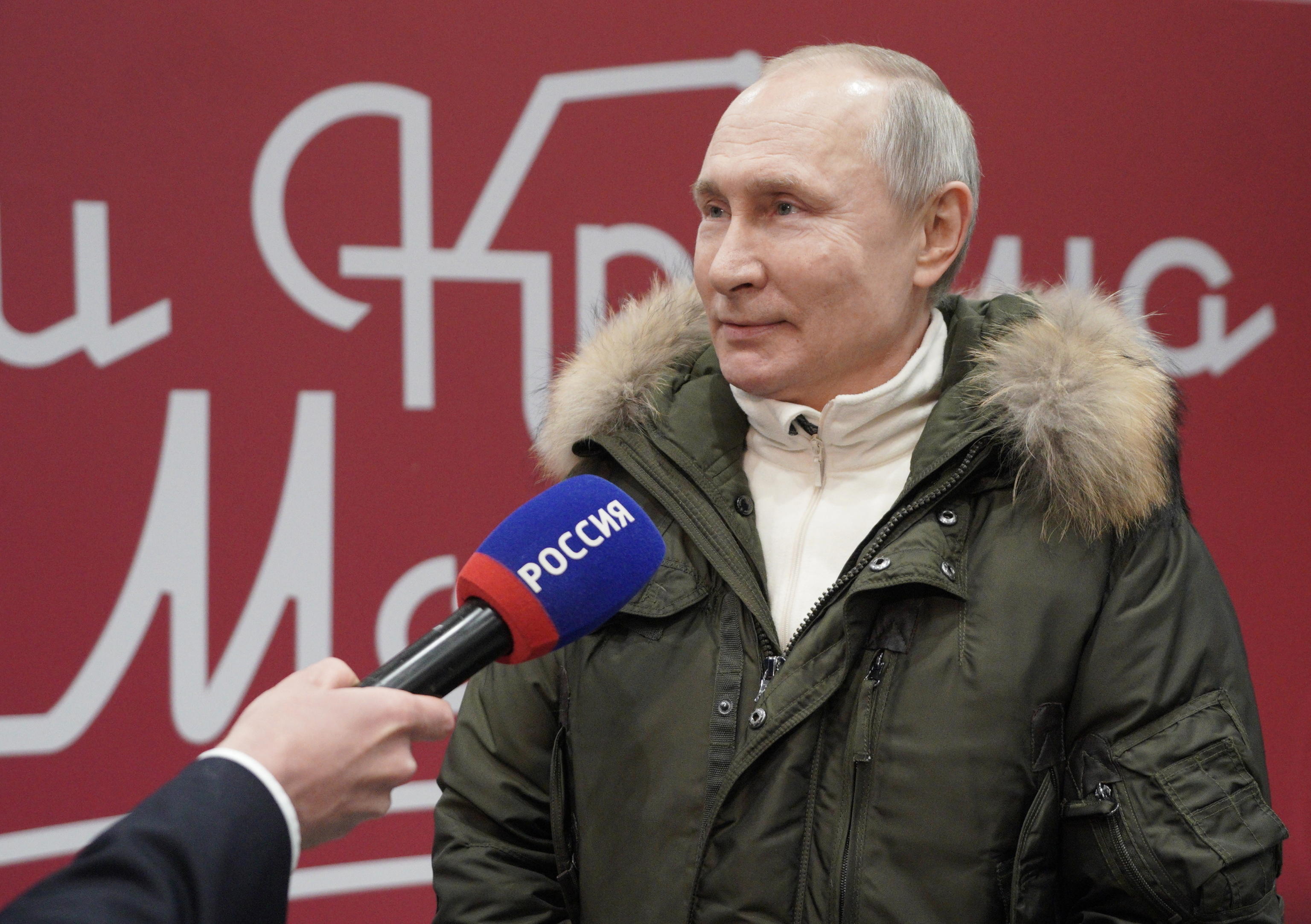 epa09082390 Russian President Vladimir Putin speaks during the concert marking the seventh anniversary of the reunification of the Crimea with Russia, in Moscow, Russia, 18 March 2021.  EPA/ALEXEI DRUZHININ / SPUTNIK / KREMLIN POOL MANDATORY CREDIT