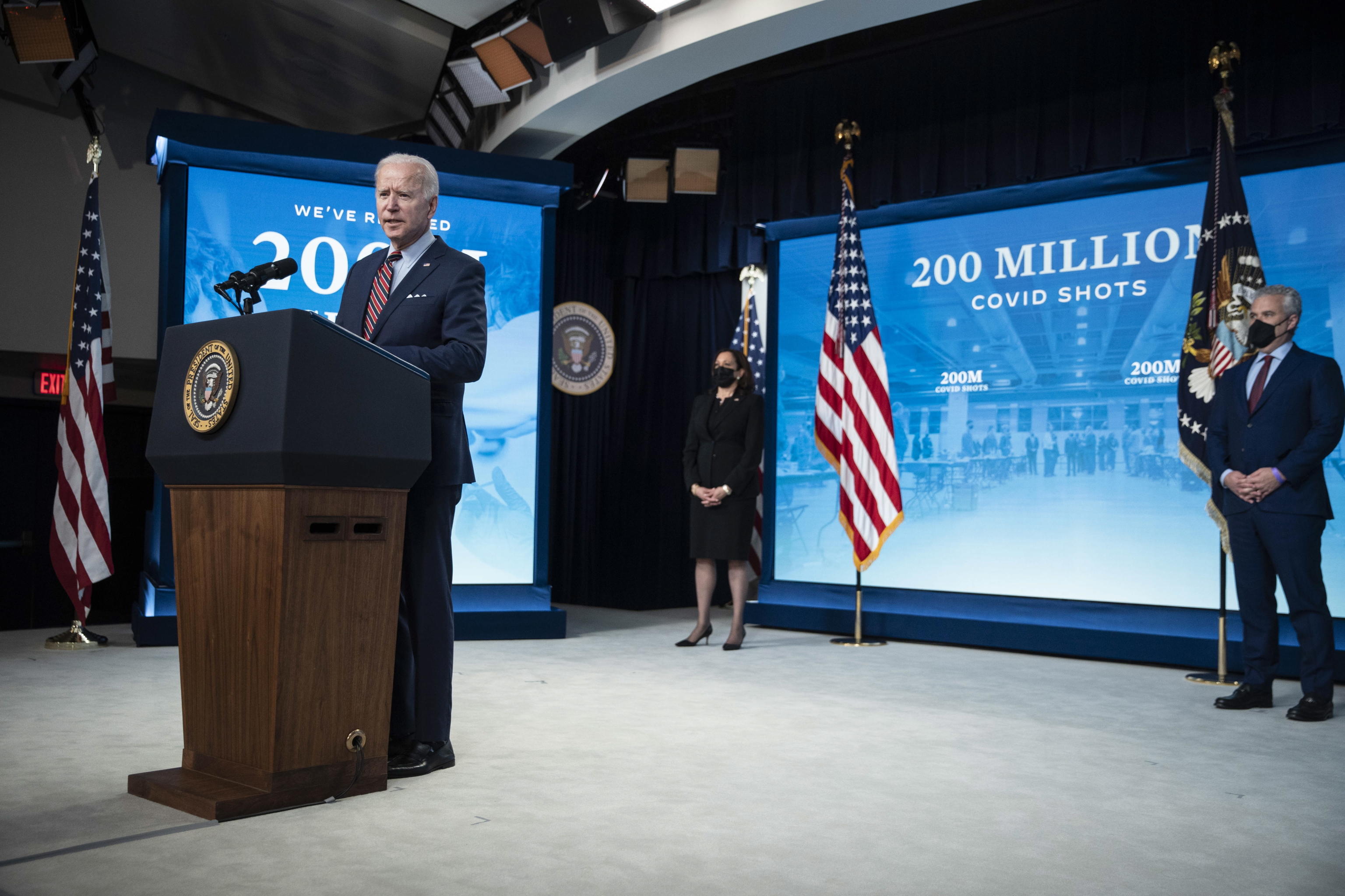 epa09150651 US President Joe Biden speaks in the Eisenhower Executive Office Building in Washington, DC, USA, on 21 April 2021. Biden announced that the US will achieve its goal on 22 April of giving 200 million vaccine shots in his first 100 days in office, while pivoting to a new phase of the campaign by urging businesses to make vaccination as accessible as possible.  EPA/Sarah Silbiger / POOL