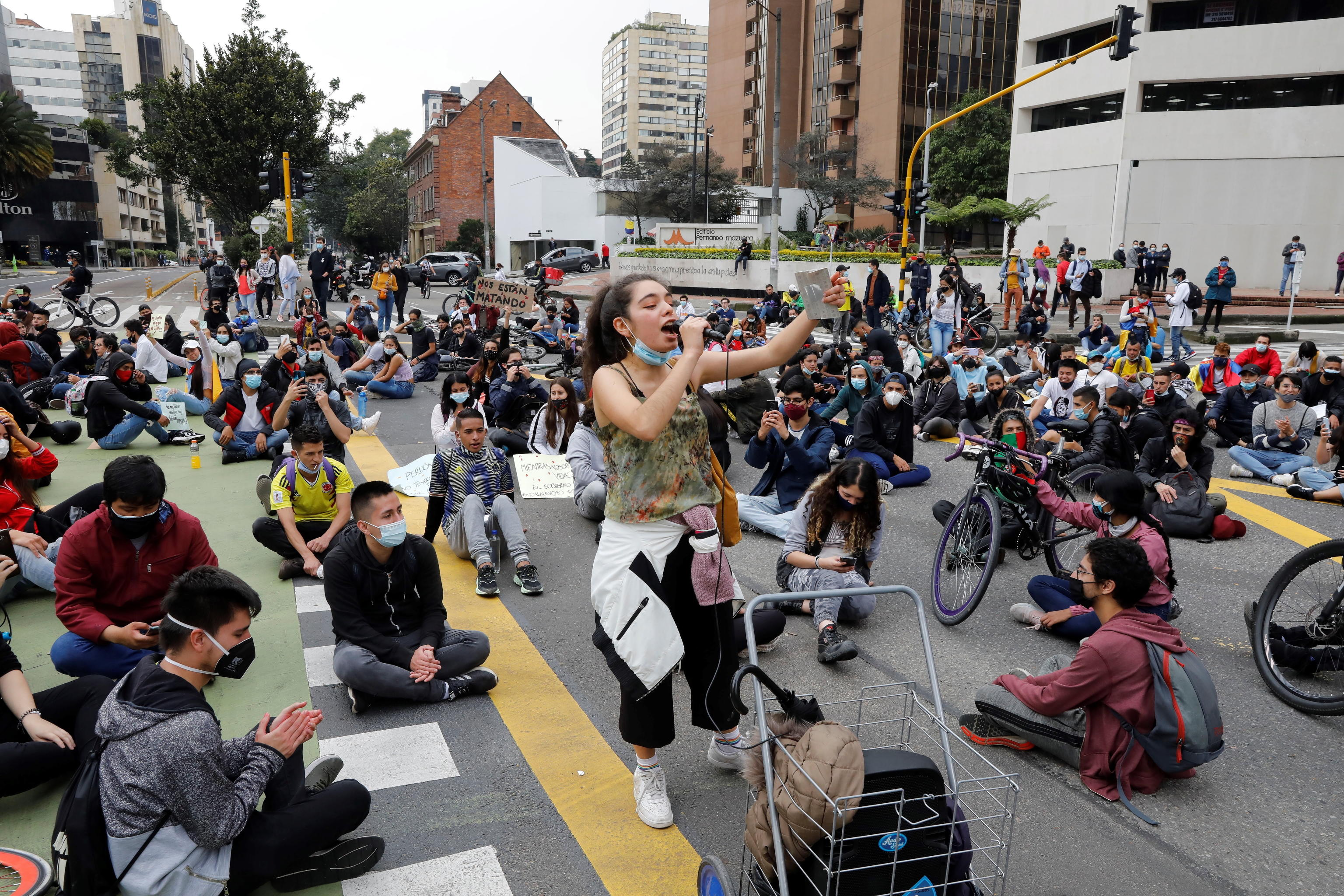 epa09178031 Students join the protesters who march through the streets, during a new day of protests in Bogota, Colombia, 04 May 2021. Tension reigns in the streets of Colombia due to the protests that have left at least 19 dead and more than 800 injured, while the international community and leaders of political parties call for dialogue to overcome the crisis caused by the protests that completed seven days.  EPA/Carlos Ortega
