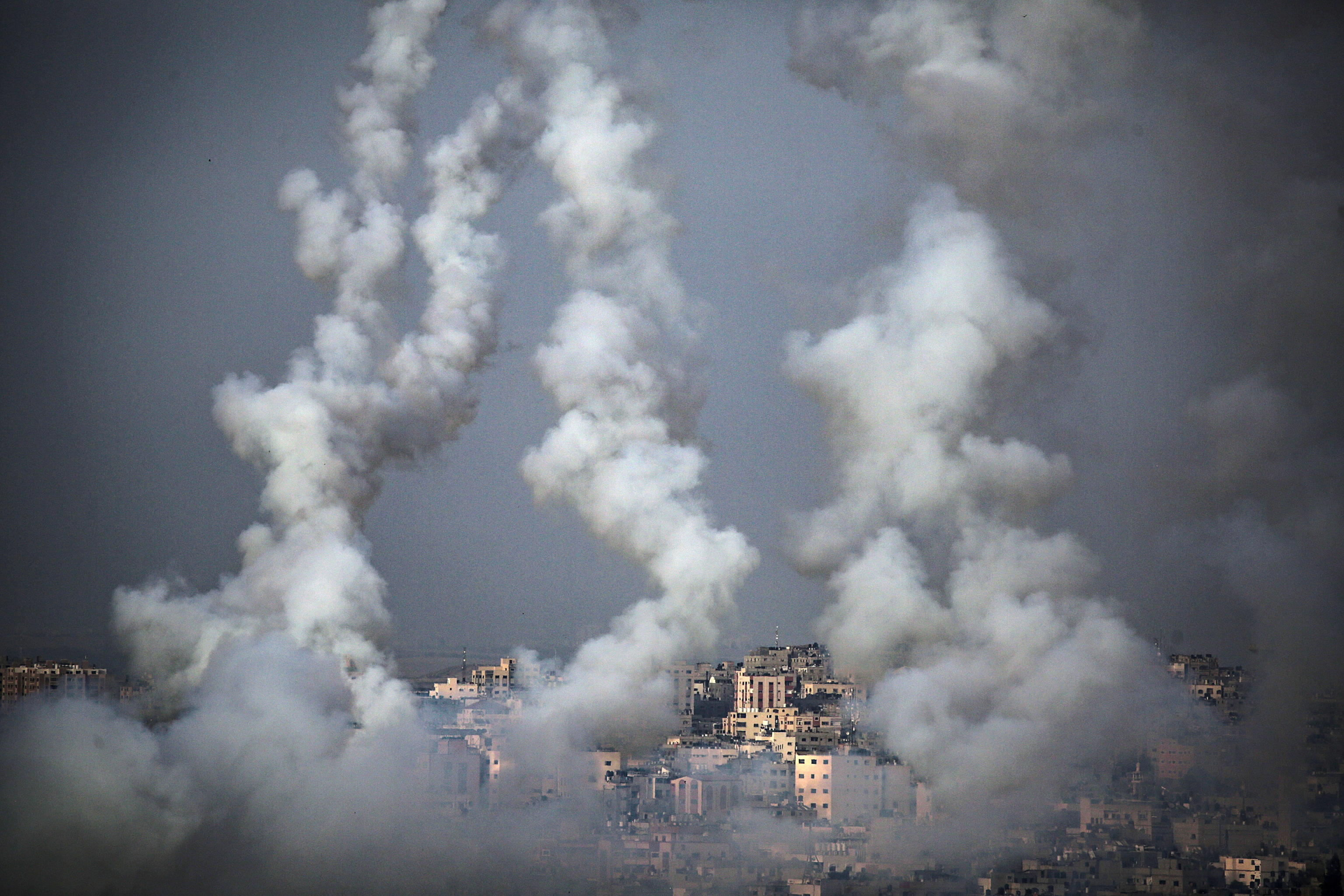 epa09189955 Rockets fired from Gaza fly towards Israel, in Gaza City, 10 May 2021. Sirens went off on 10 May in Jerusalem after rockets were fired from the Gaza strip. According to the Israel Defense Forces (IDF), an Israeli civilian in a nearby vehicle was lightly injured and evacuated for treatment. The Gaza Ministry of health announced shortly after the death of about nine people after an Israeli strike on northern part of the Gaza strip.  EPA/MOHAMMED SABER