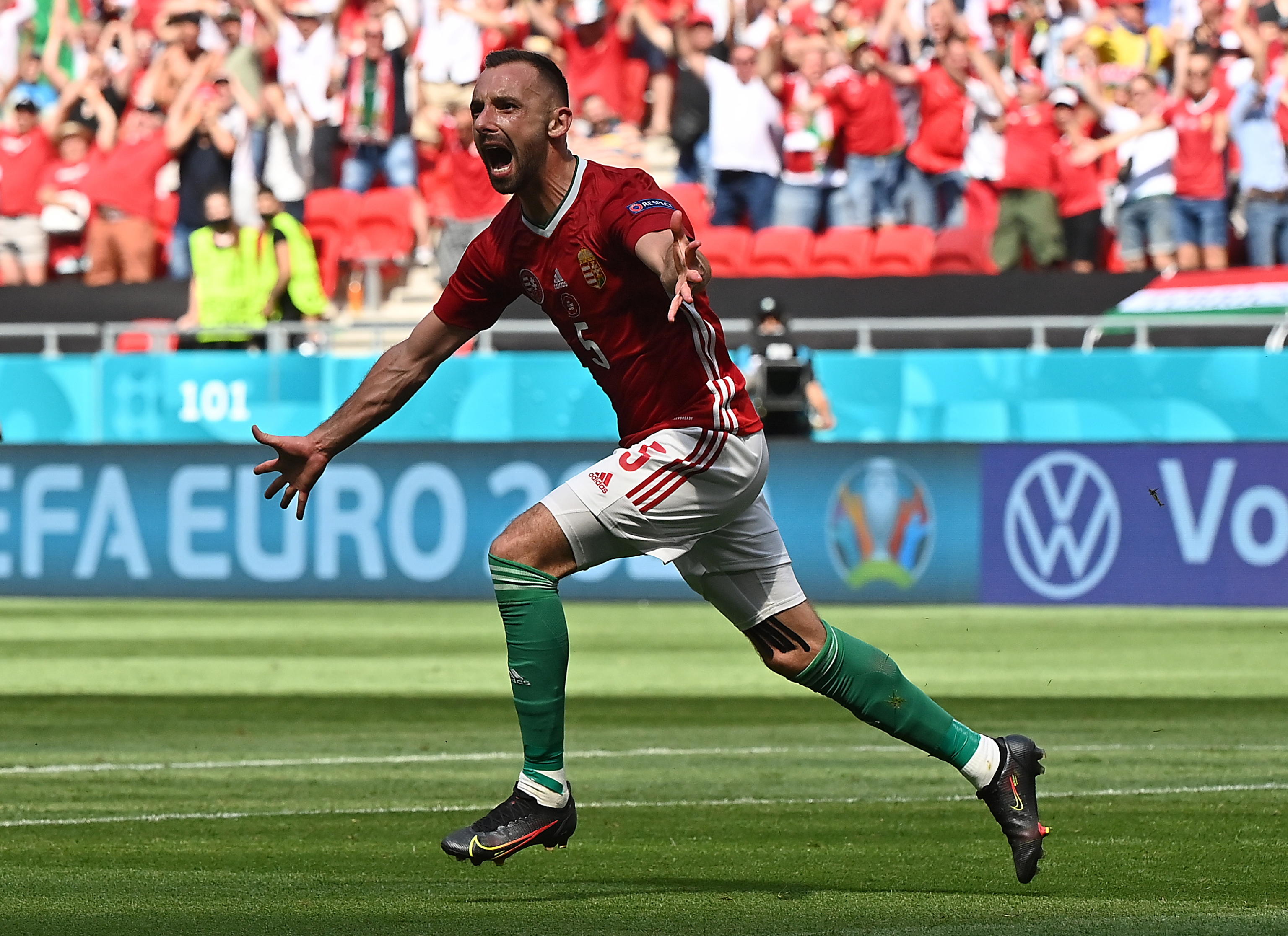 epa09285497 Attila Fiola of Hungary celebrates after scoring his team's first goal during the UEFA EURO 2020 group F preliminary round soccer match between Hungary and France in Budapest, Hungary, 19 June 2021.  EPA/Tibor Illyes / POOL (RESTRICTIONS: For editorial news reporting purposes only. Images must appear as still images and must not emulate match action video footage. Photographs published in online publications shall have an interval of at least 20 seconds between the posting.)