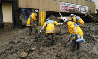 epa09323421 Tokyo Metropolitan Police Department rescue workers are searching for missing people on the mudslide triggered by torrential rain at hot-spring resort area Izusan in Atami, Shizuoka Prefecture, central Japan, 05 July 2021, while about 1,000 rescue workers are deployed on the day. Atami Mayor announced in the morning of 05 July 2021 the city has not confirmed about 100 people's safety yet after the city has announced about 20 people are missing since 03 July 2021 after the mudslide. Japanese news agency Jiji Press has reported city officials try to confirm safety of 80 people. Three people were confirmed dead by the mudslide.  EPA/KIMIMASA MAYAMA