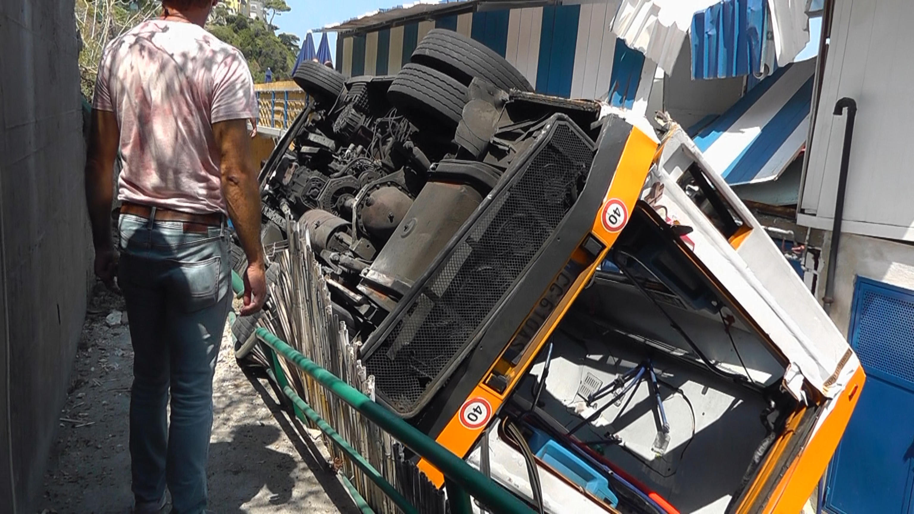 Rescue after the accident that involved a minibus carryng a dozen people who went of the road in Capri (Naples), Italy, 22 July 2021. One person died. ANSA/ GIUSEPPE CATUOGNO