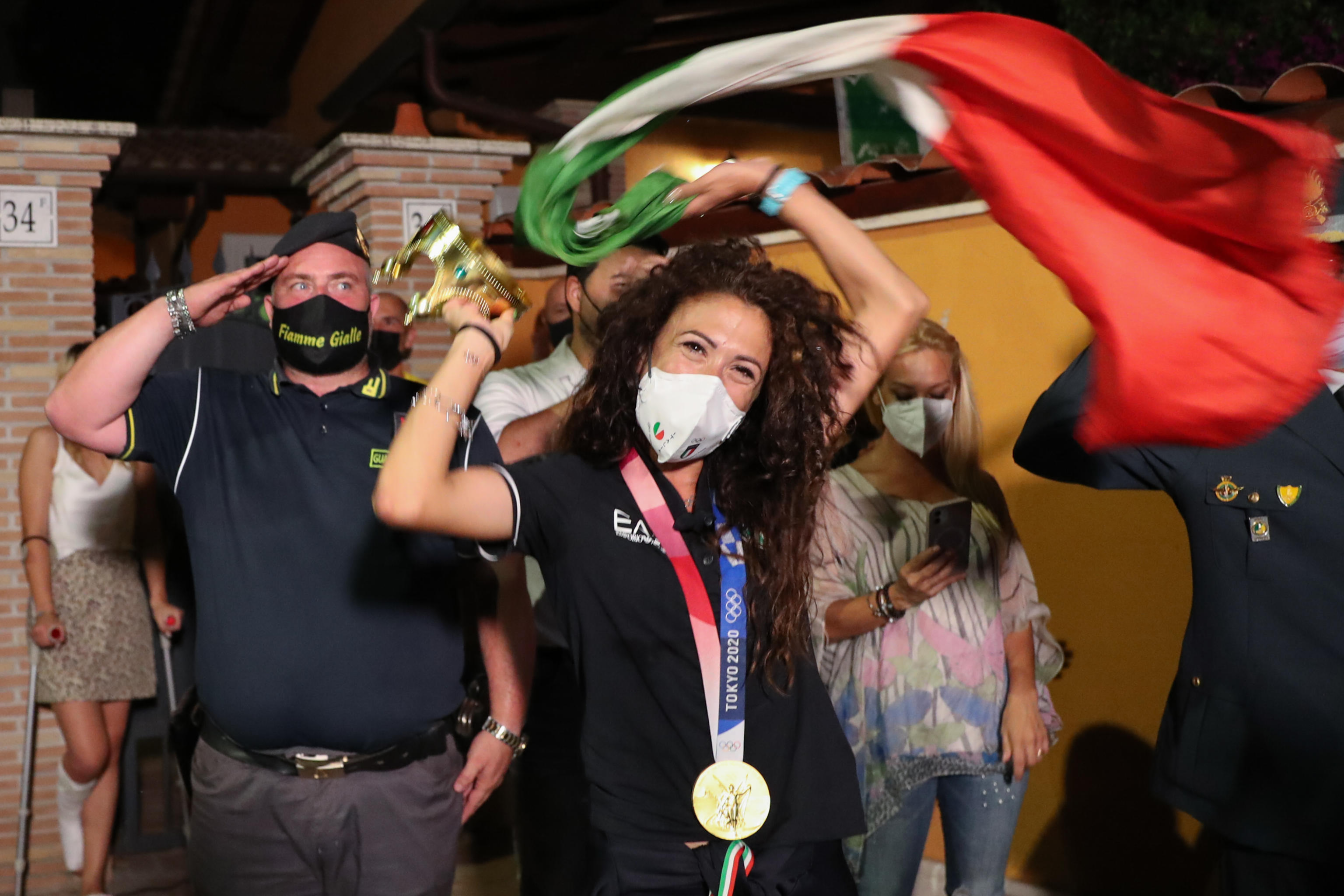 Antonella Palmisano è stata accolta in aeroporto da una notevole quantità di tifosi, che insieme al marito Lorenzo Dessi le hanno organizzato una festa a sorpresa a casa. 9 AGOSTO 2021. FIUMICINO- BAGNOLETTO, ROMA. ANSA/EMANUELE VALERI