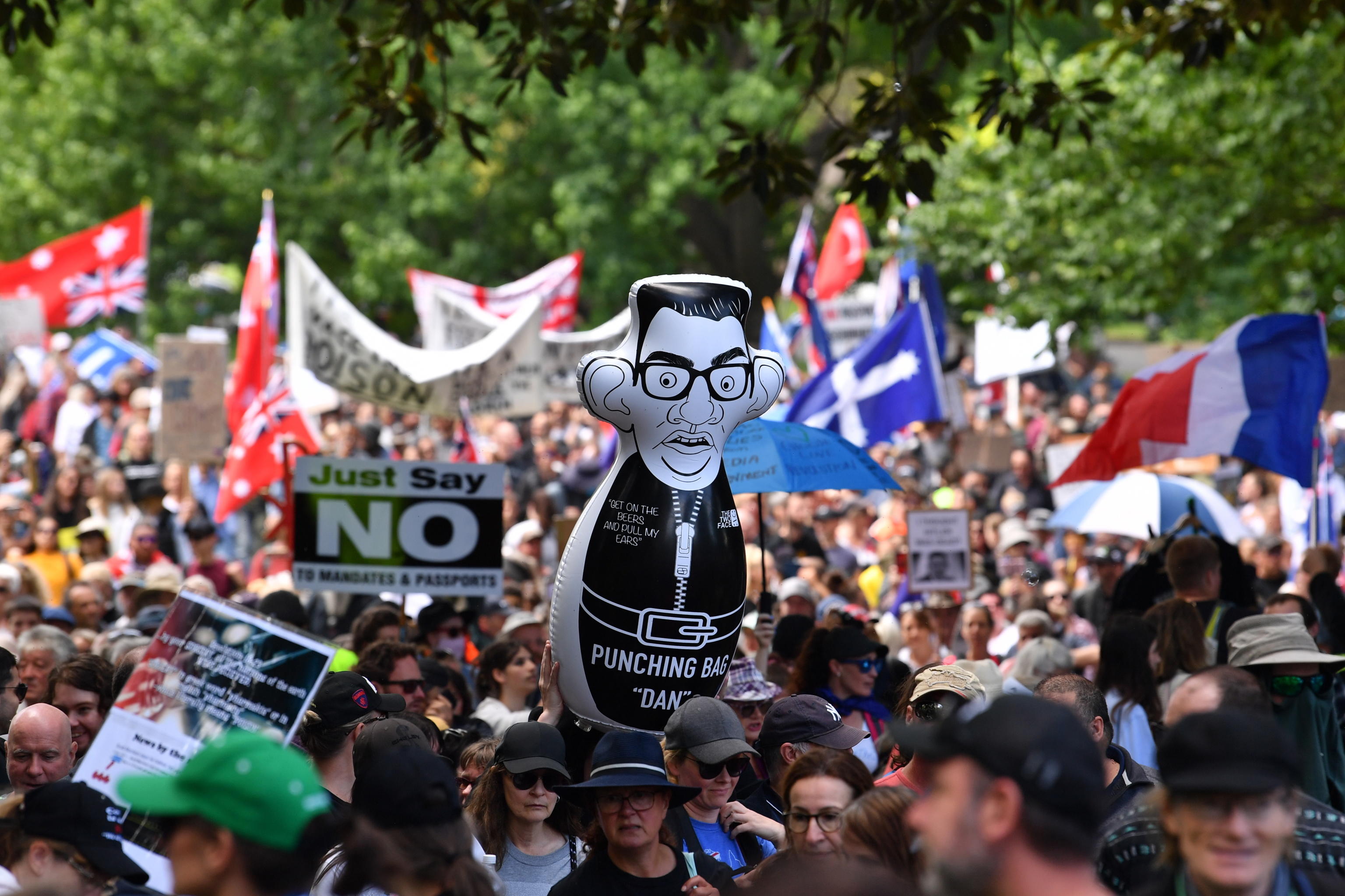 epa09620179 People participate in the Eureka Freedom Rally, an anti-vaccination and anti-mandatory vaccination protest in Melbourne, Australia, 04 December 2021.  EPA/JOEL CARRETT AUSTRALIA AND NEW ZEALAND OUT