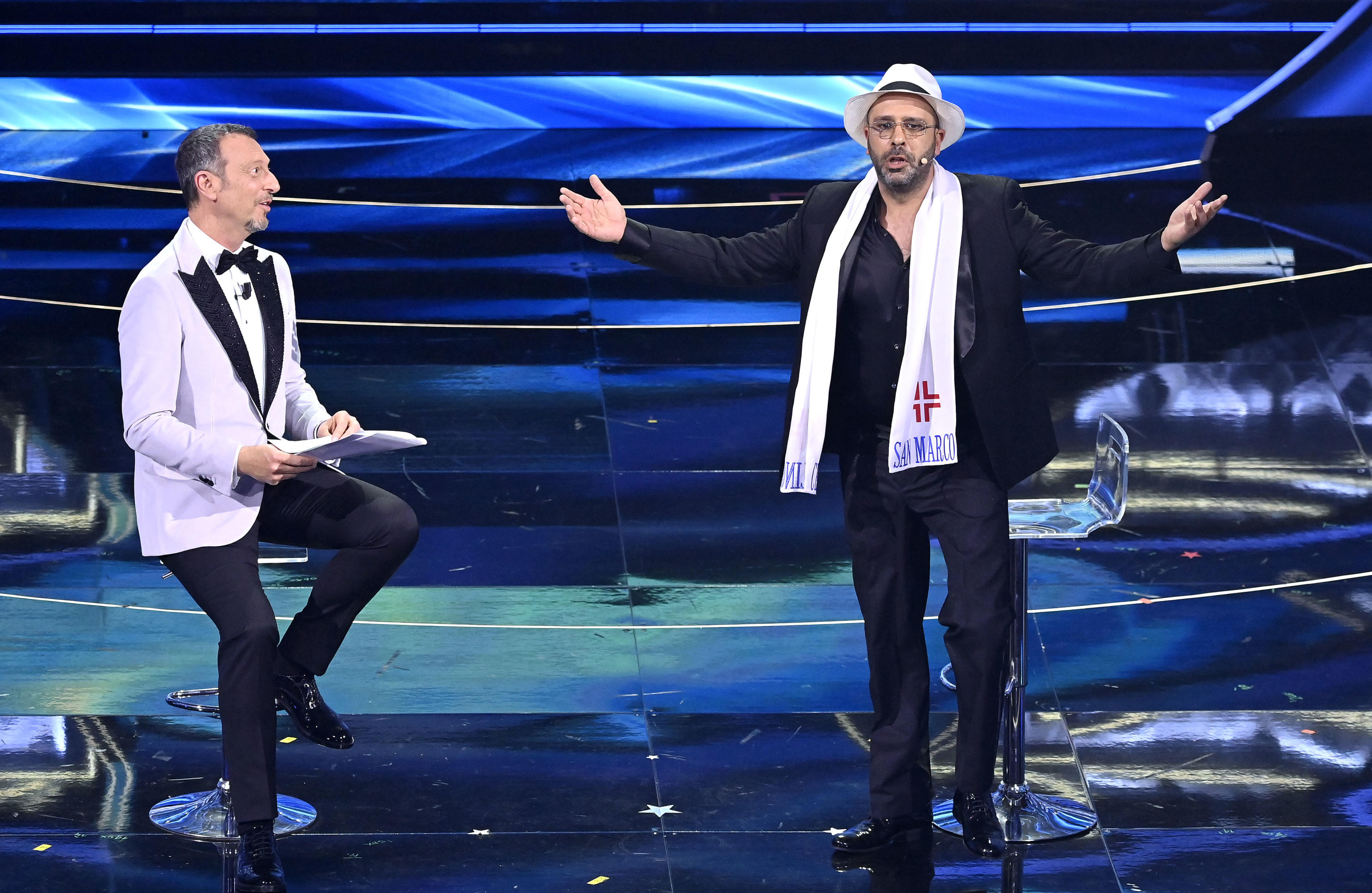 Sanremo Festival host and artistic director, Amadeus (L) and Italian actor Checco Zalone (R) on stage at the Ariston theatre during the 72nd Sanremo Italian Song Festival, in Sanremo, Italy, 02 February 2022. The music festival runs from 01 to 05 February 2022.    ANSA/RICCARDO ANTIMIANI