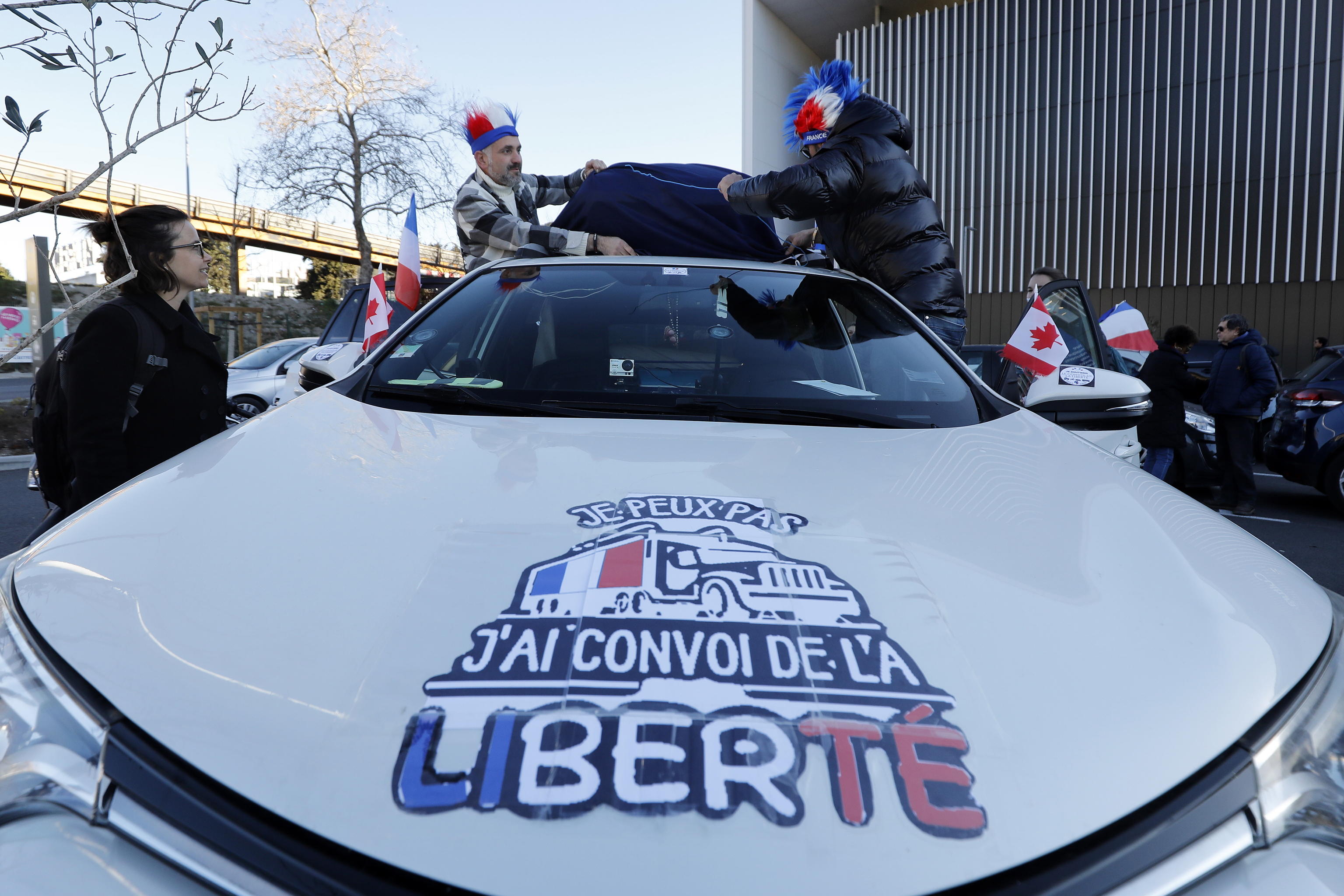 Members of the 'Freedom Convoy 2022' gather before heading to Paris, in Nice, France, 09 February 2022. A series of convoy demonstrations has been taking place in France to call for the lifting of all Covid-19 restrictions and vaccine mandates, in light of the ongoing protest in Canada, where truck drivers have been rallying against the government-imposed mandatory Covid-19 vaccine to enter the country. ANSA/SEBASTIEN NOGIER