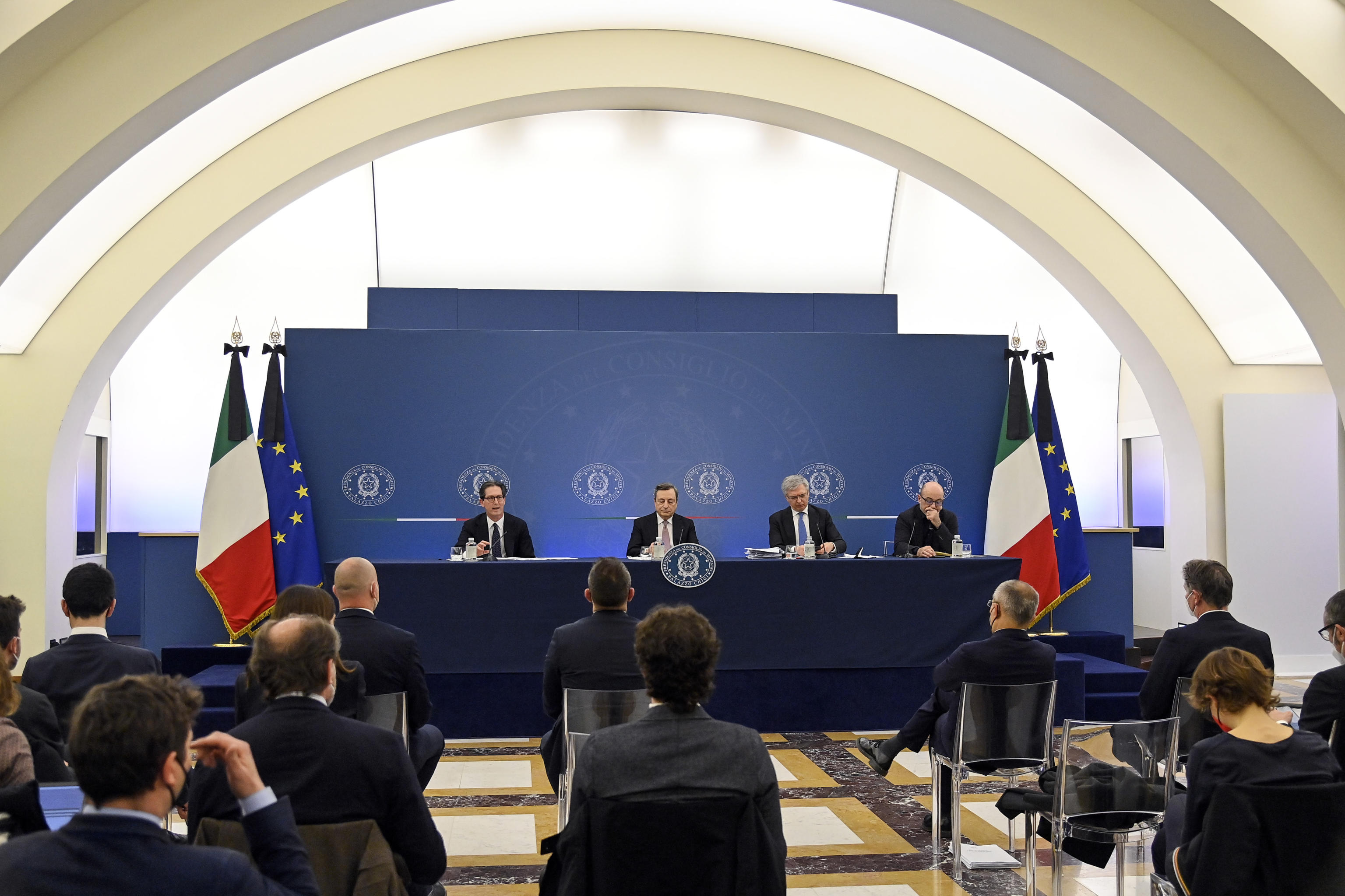 (L-R) Italian Undersecretary to the Presidency of the Council of Ministers Roberto Garofoli, Italian Prime Minister Mario Draghi, Italian. Economy Minister Daniele Franco, and Italian Minister of Ecological Transition Roberto Cingolani during a press conference at the end of the Council of Ministers, to illustrate the new measures to combat expensive energy and economic effects of the crisis in Ukraine, at the Multifunctional Hall of the Presidency of the Council of Ministers in Rome, Italy, 18 March 2022. ANSA/RICCARDO ANTIMIANI