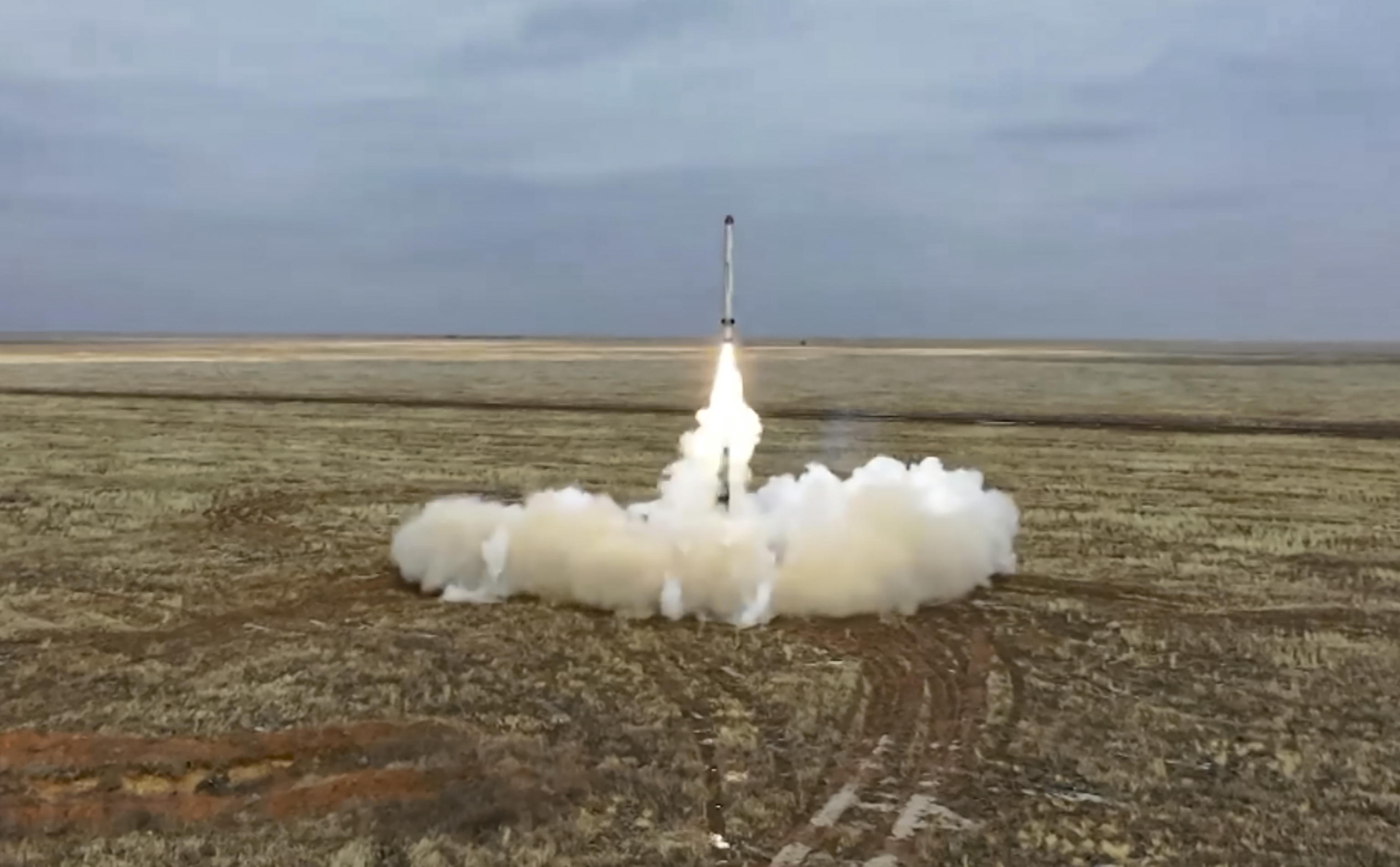 epa09771655 A handout still image taken from handout video made available by the Russian Defence ministry press-service shows launch of a cruise missile of the operational-tactical missile system 'Iskander' from at the Kapustin Yar training ground, Russia, 19 February 2022. Russian President Vladimir Putin opens exercises of the Russian strategic deterrence forces with launches of the ballistic missiles. Russian Navy ships of the Northern and Black Sea Fleets launched 'Kalibr' cruise missiles and 'Zirkon' hypersonic missiles at sea and ground targets during scheduled exercises of the strategic deterrence forces on Saturday. The 'Yars' intercontinental ballistic missile was launched from Plesetsk at the Kura training ground.  EPA/RUSSIAN DEFENCE MINISTRY PRESS SERVICE / HANDOUT  HANDOUT EDITORIAL USE ONLY/NO SALES