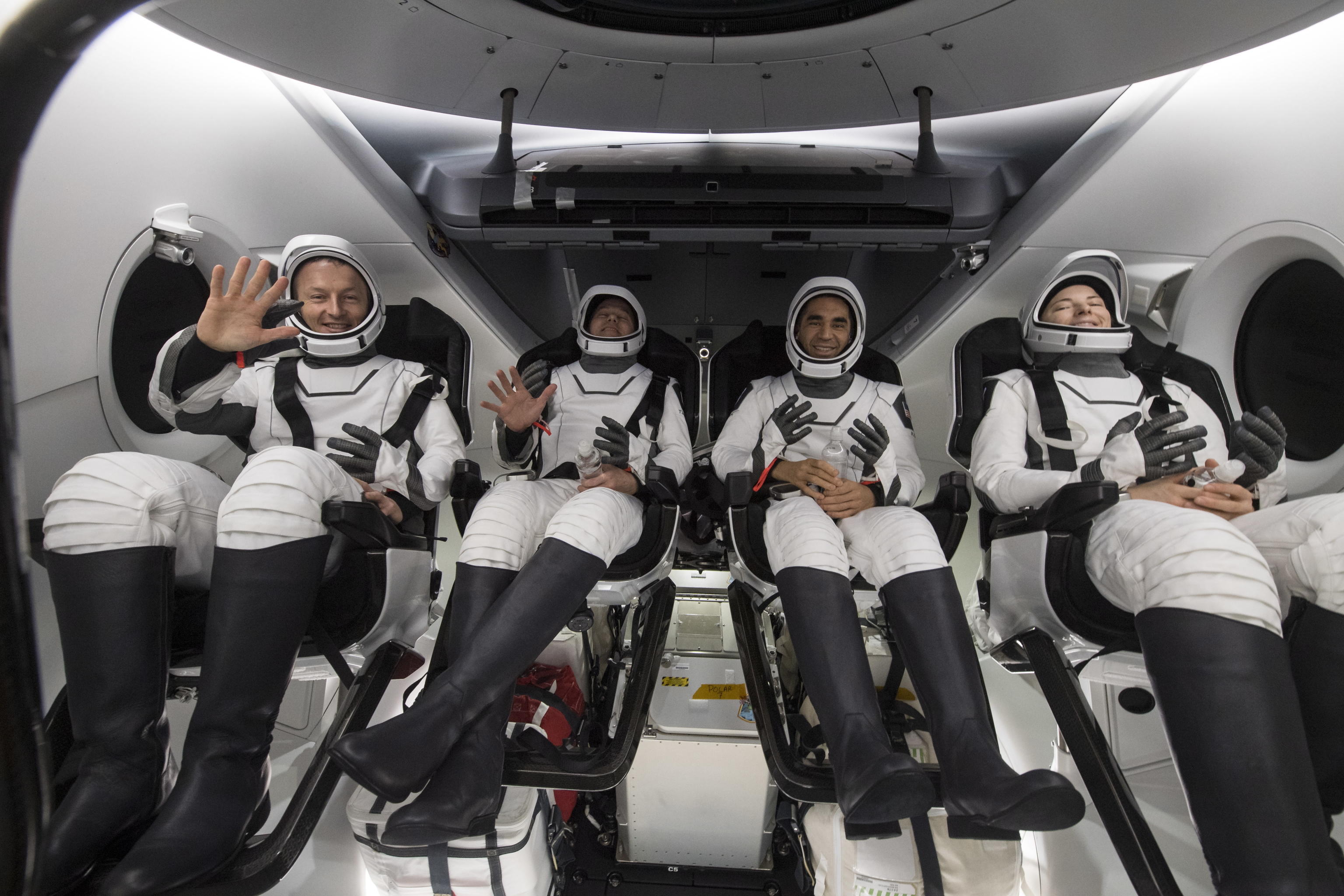 epa09929655 A handout photo made available by NASA shows (L-R) ESA (European Space Agency) astronaut Matthais Maurer, NASA astronauts Tom Marshburn, Raja Chari, and Kayla Barron, sitting inside the SpaceX Crew Dragon Endurance spacecraft onboard the SpaceX Shannon recovery ship shortly after having landed in the Gulf of Mexico off the coast of Tampa, Florida, USA, 06 May 2022. Maurer, Marshburn, Chari, and Barron are returning after 177 days in space as part of Expeditions 66 and 67 aboard the International Space Station.  EPA/NASA/Aubrey Gemignani HANDOUT MANDATORY CREDIT: (NASA/Aubrey Gemignani) HANDOUT EDITORIAL USE ONLY/NO SALES
