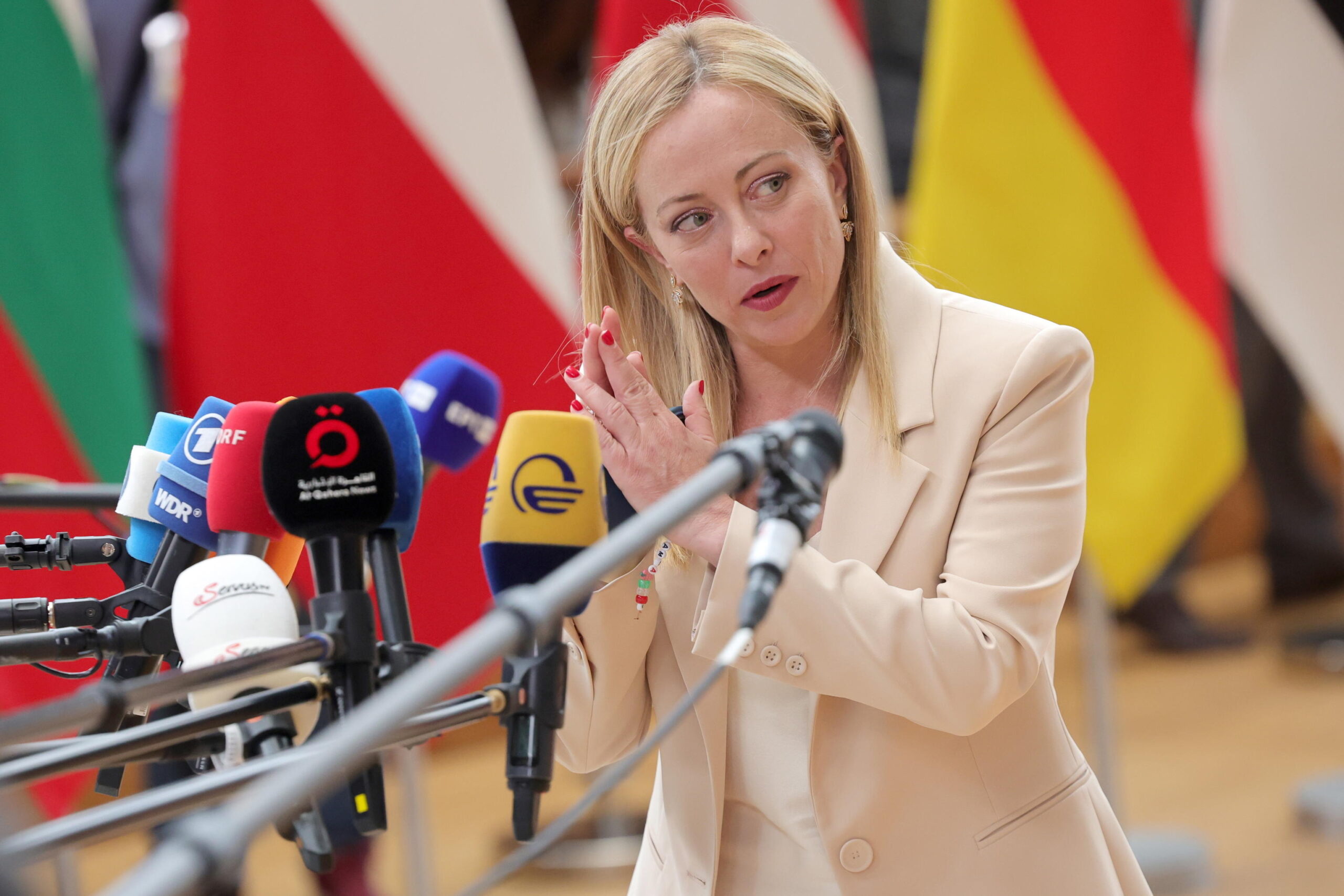epa10716985 Italy's Prime Minister Giorgia Meloni speaks to the media as she arrives for a European Council in Brussels, Belgium, 29 June 2023. EU leaders are gathering in Brussels for a two-day summit to discuss the latest developments in relation to Russia's invasion of Ukraine and continued EU support for Ukraine as well as the block's economy, security, migration and external relations, among other topics.  EPA/OLIVIER MATTHYS