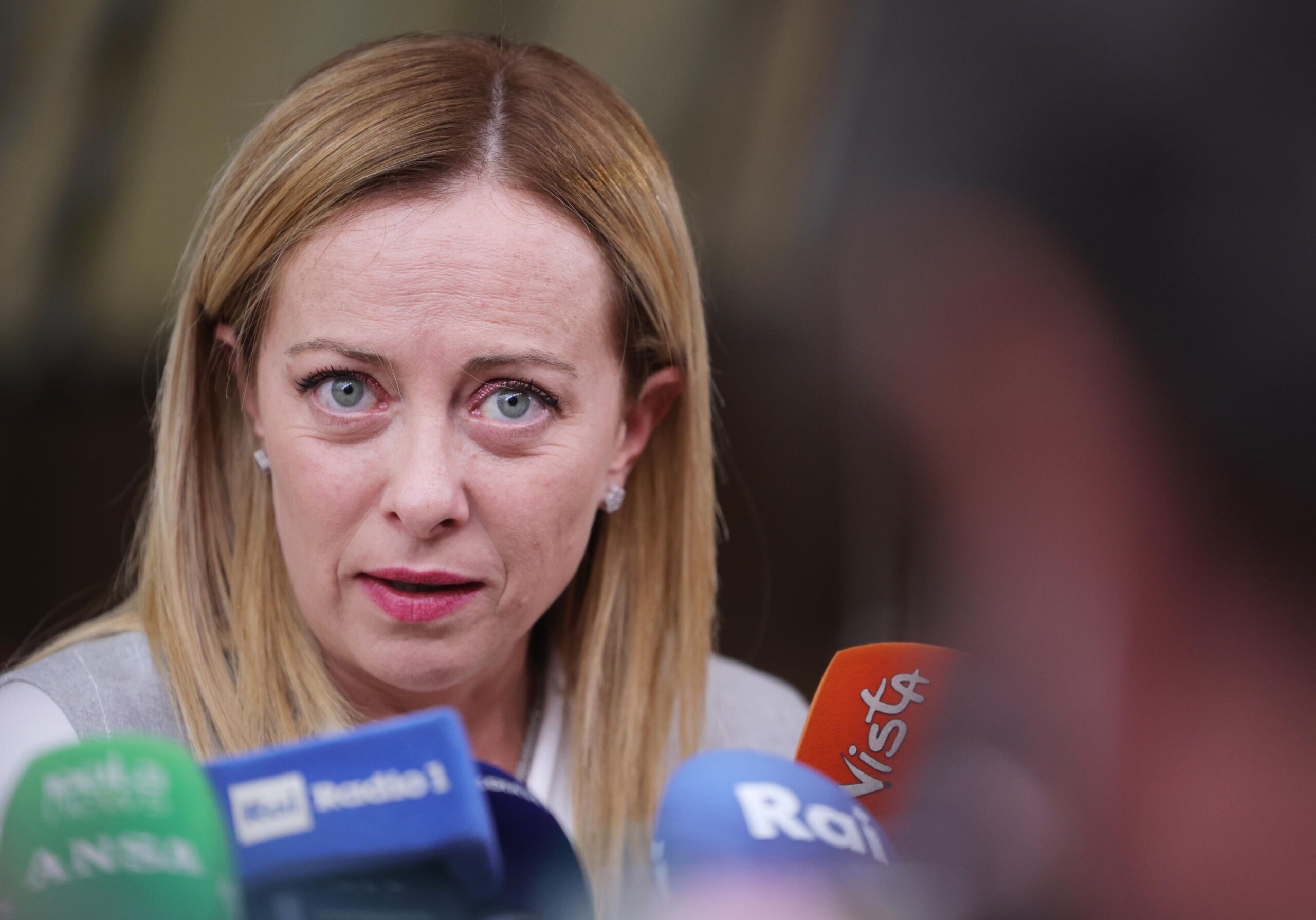 epaselect epa10940406 Italy's Prime Minister Giorgia Meloni speaks to the press upon arrival for the European Council meeting in Brussels, Belgium, 26 October 2023. In a two-day summit on 26-27 October, EU leaders are expected to address the situation in the Middle-East and Ukraine, as well as the EU's long-term budget, migration, and external relations.  EPA/OLIVIER MATTHYS