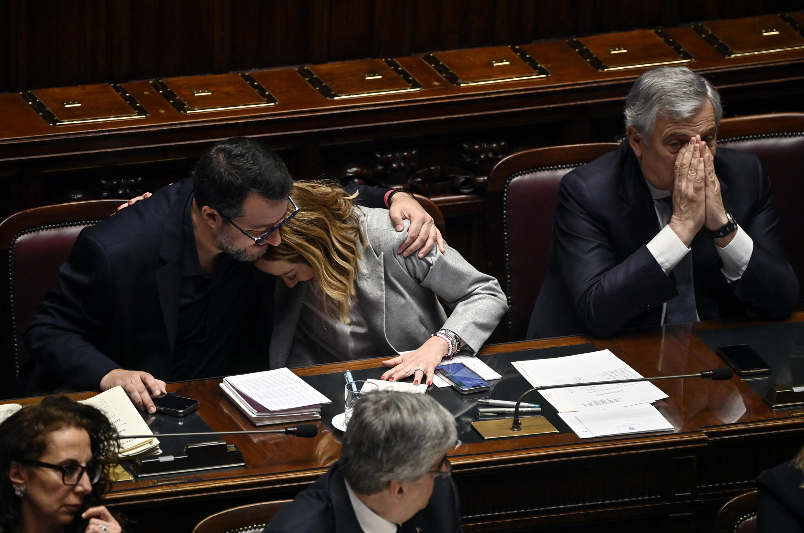 Italian Prime Minister Giorgia Meloni (C) with Italian Minister of Infrastructures, Matteo Salvini (L), and Italian Minister of Foreign Affairs, Antonio Tajani (R), during a session in the Chamber of Deputies, as she reported to the Lower House ahead of the European Council taking place in Brussels on 21 and 22 March, Rome, Italy, 20 Marcxh 2024. ANSA/RICCARDO ANTIMIANI