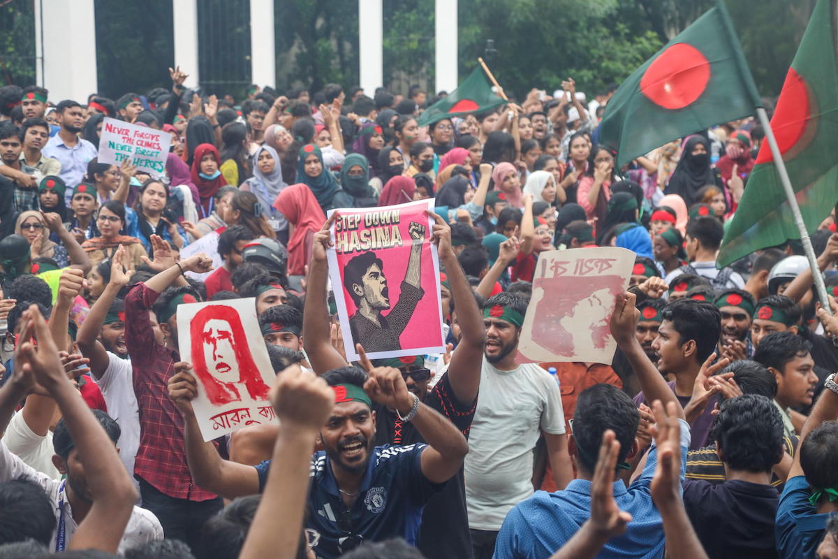 epa11522624 Protesters hold a placards as they take part in a demonstration at the Central Shaheed Minar in Dhaka, Bangladesh, 03 August 2024. The Anti-Discrimination Student Movement organizers are demanding the resignation of the current government. They also announced plans to initiate a non-cooperation movement starting 04 August 2024. Authorities in Bangladesh have announced a gradual easing of the curfew imposed after mass protests last week, allowing offices to open and some activity, and partially restoring telecommunication services. As casualties mounted and law enforcement struggled to contain the unrest, the Bangladeshi government on 20 July 2024 imposed a nationwide curfew and deployed military forces after violence broke out in Dhaka and other regions following student-led protests demanding reforms to the government's job quota system.  EPA/MONIRUL ALAM