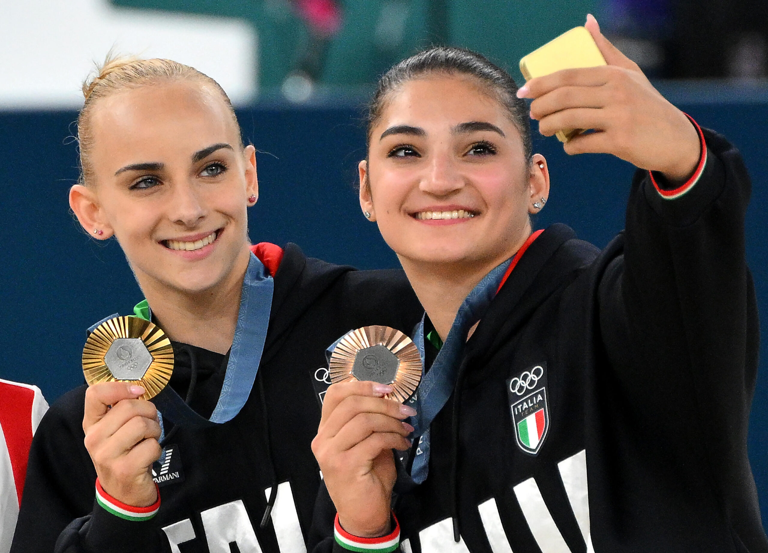 Gold medalist Alice D' Amato of Italy (L) and bronze medalst Manila Esposito of Italy pose on the podium for the Women Balance Beam final of the Artistic Gymnastics competitions in the Paris 2024 Olympic Games, at the Bercy Arena in Paris, France, 05 August 2024.ANSA/ETTORE FERRARI