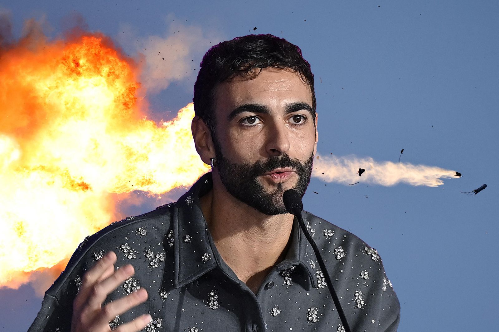 https://static.open.online/wp-content/uploads/2025/06/marco-mengoni-guerra-quanto-guadagna.jpeg