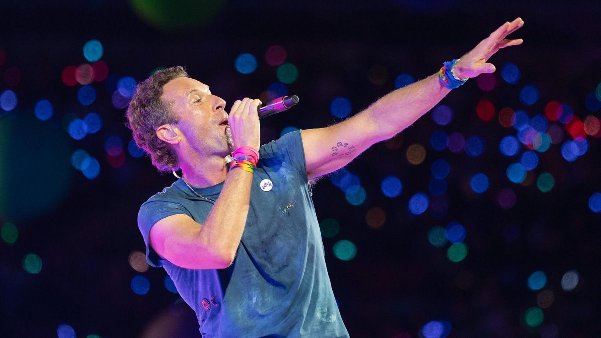 https://static.open.online/wp-content/uploads/2025/09/chris_martin_coldplay_wembley.jpg