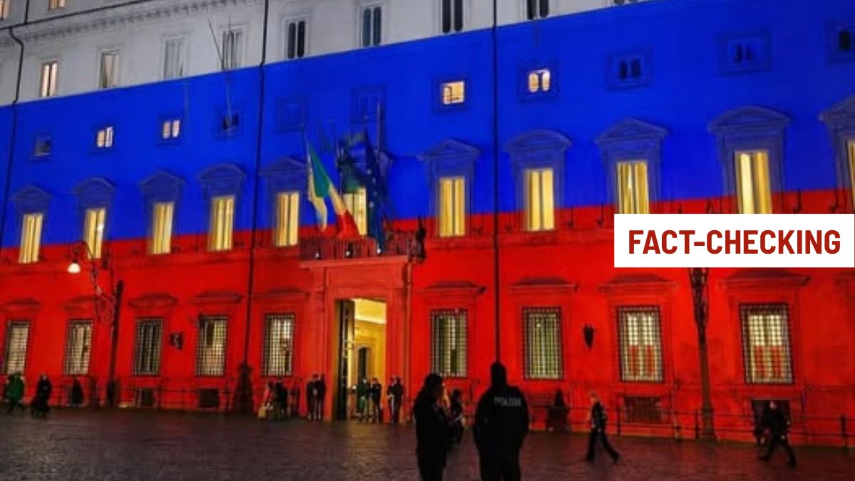 Immagine con watermark Fact-checking di Open che mostra il fotomontaggio della bandiera russa su Palazzo Chigi