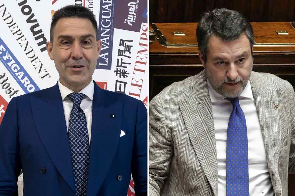 Uomo in abito scuro parla in primo piano durante conferenza stampa su tema legale e sicurezza