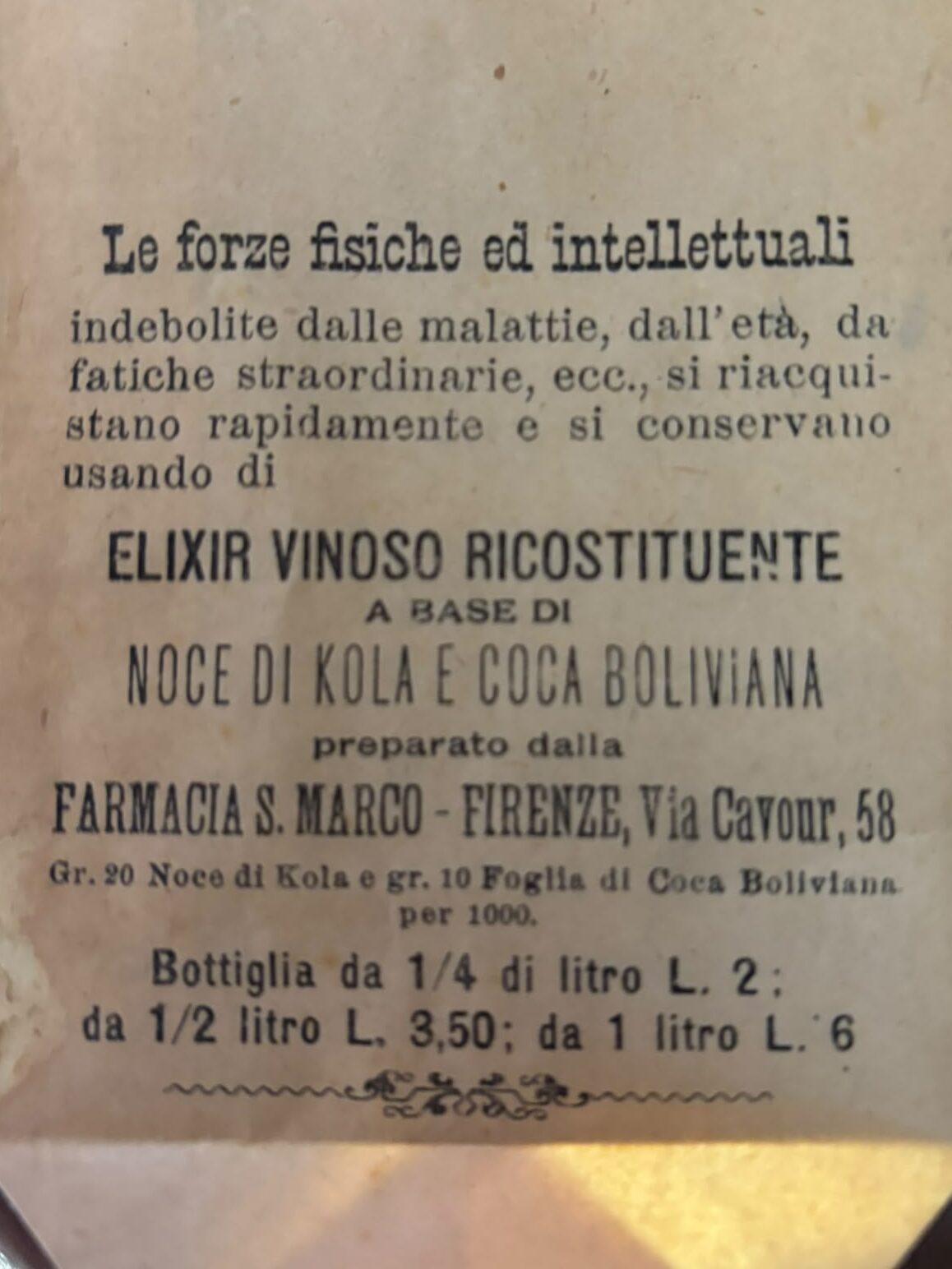 Retro dell’antico involucro della Farmacia di San Marco con la ricetta dell'elisir vinoso ricostituente a base di foglie di coca e noci di cola