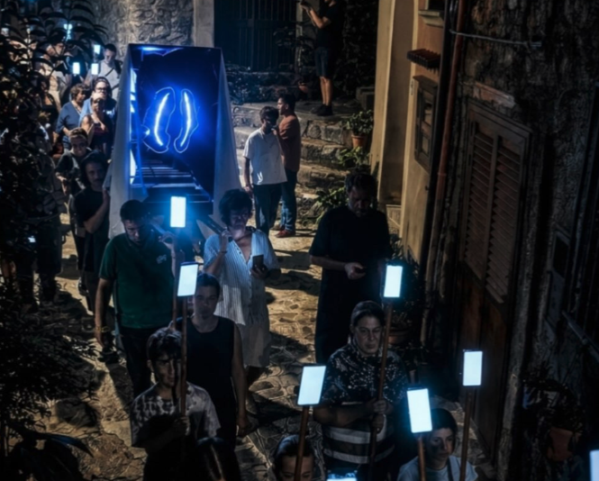 https://static.open.online/wp-content/uploads/2026/07/machina-sacra-processione.png