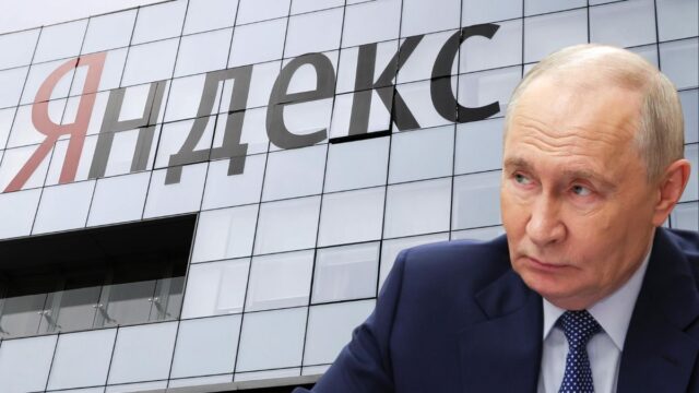 Il presidente russo Vladimir Putin in primo piano davanti alla facciata della sede della società tecnologica Yandex